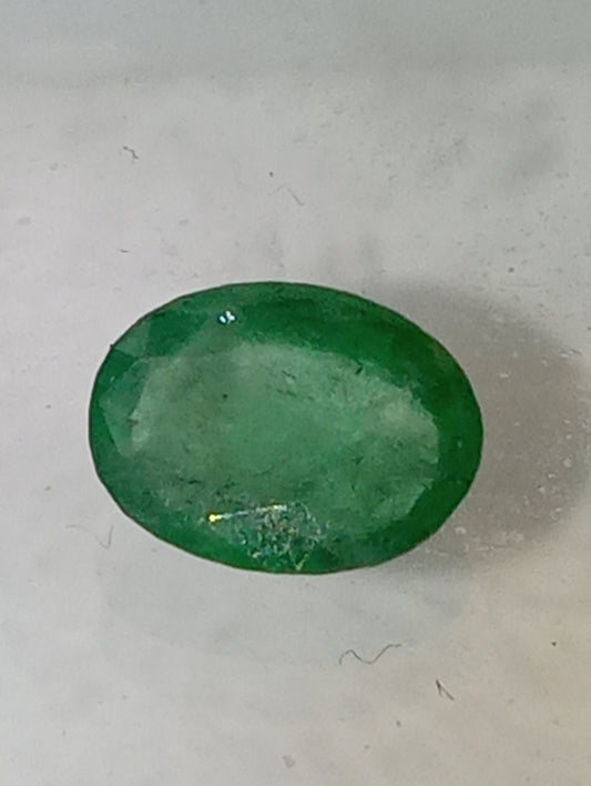 emerald gemstone, 7mmx5mm oval cut, .65ct