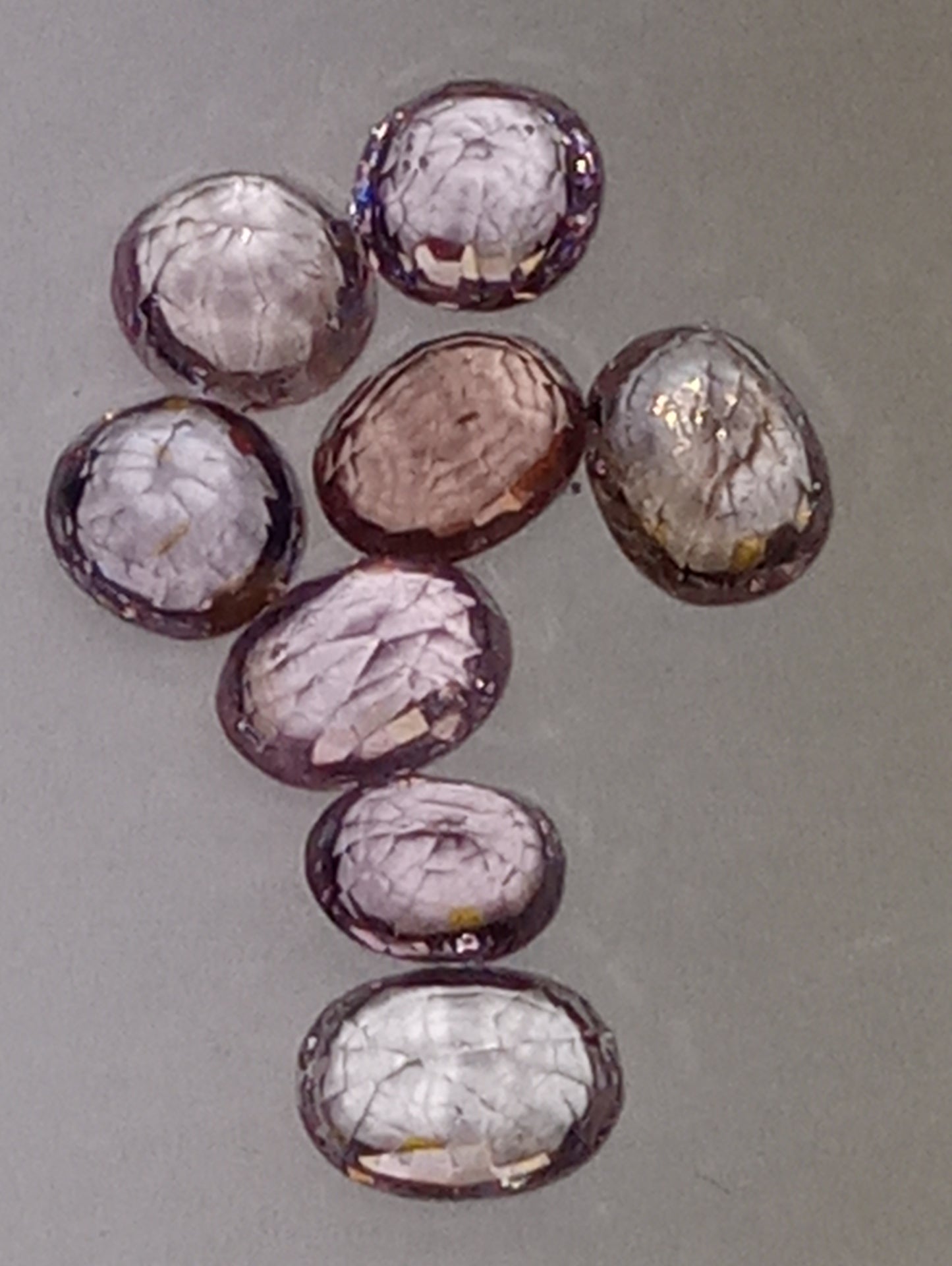 spinel gemstones, lavender and pinks, ovals and rounds, 8 stones, 4.38ctw