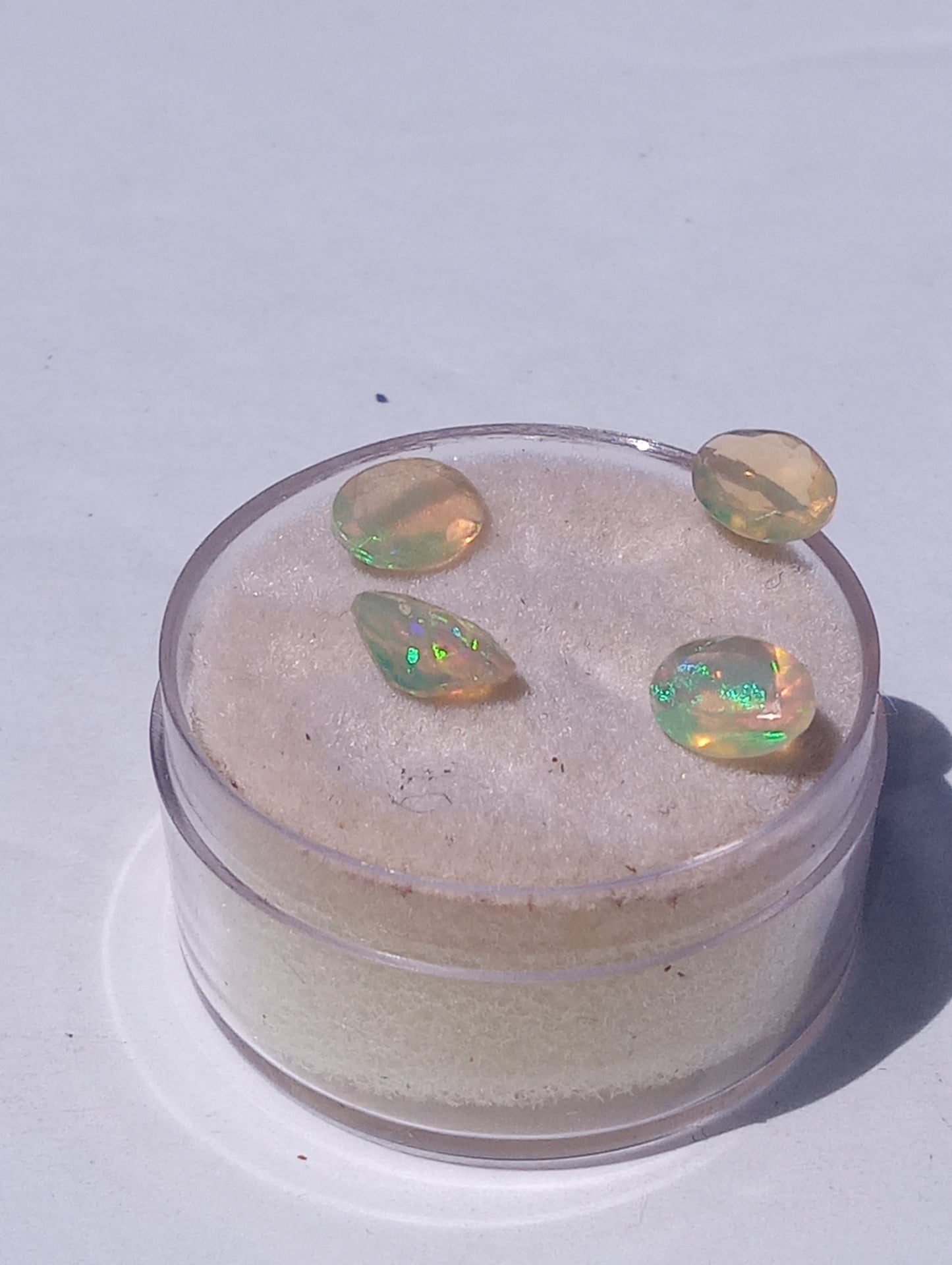 opal gemstones Ethiopian , faceted, 7mmx5mm oval cuts, 1.64ctw, 4 stones