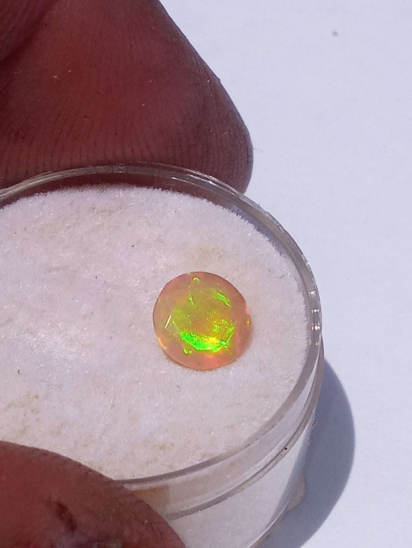 opal gemstone Ethiopian, faceted 7mm round cut, .79ct