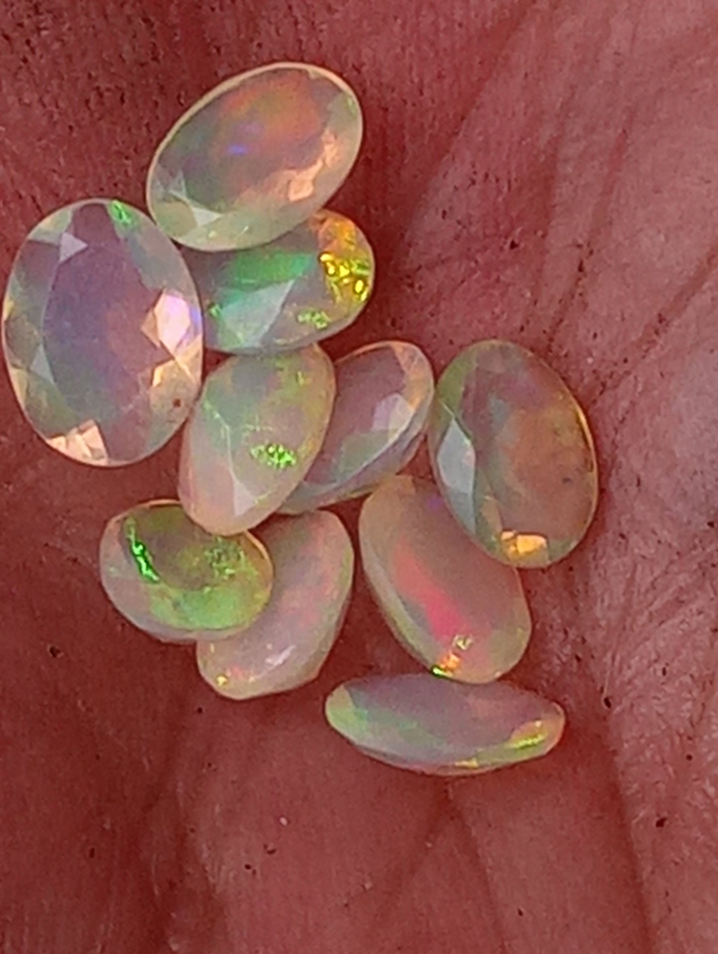 opal gemstones Ethiopian, faceted 7mmx5mm oval cuts, 10 stones