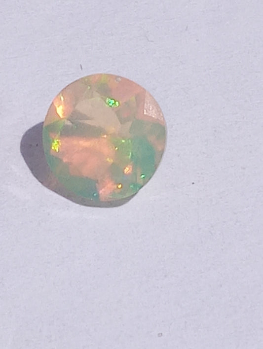 opal gemstones Ethiopian, faqceted, 7mm round cut, .76ct