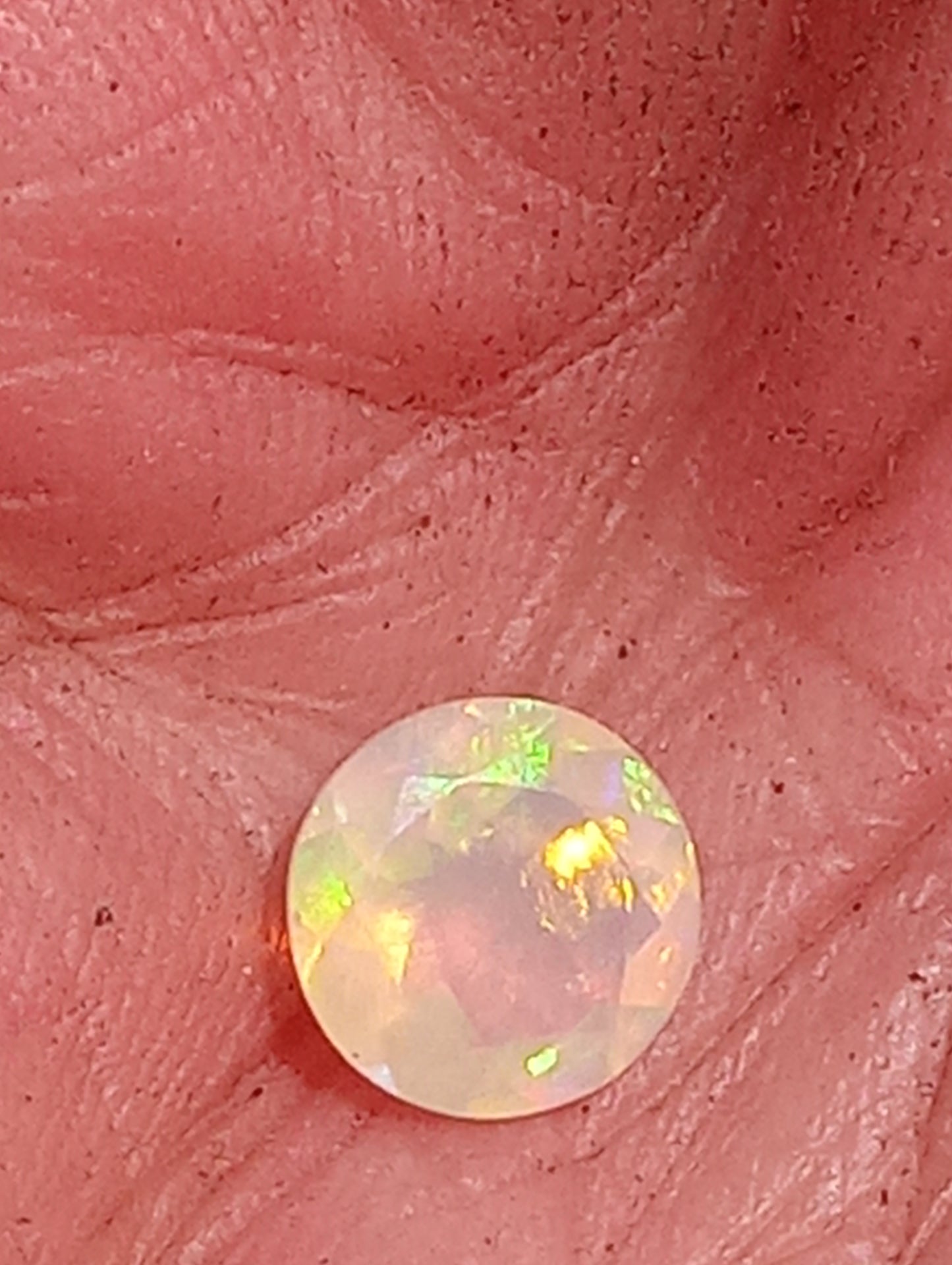 opal gemstones Ethiopian, faqceted, 7mm round cut, .76ct