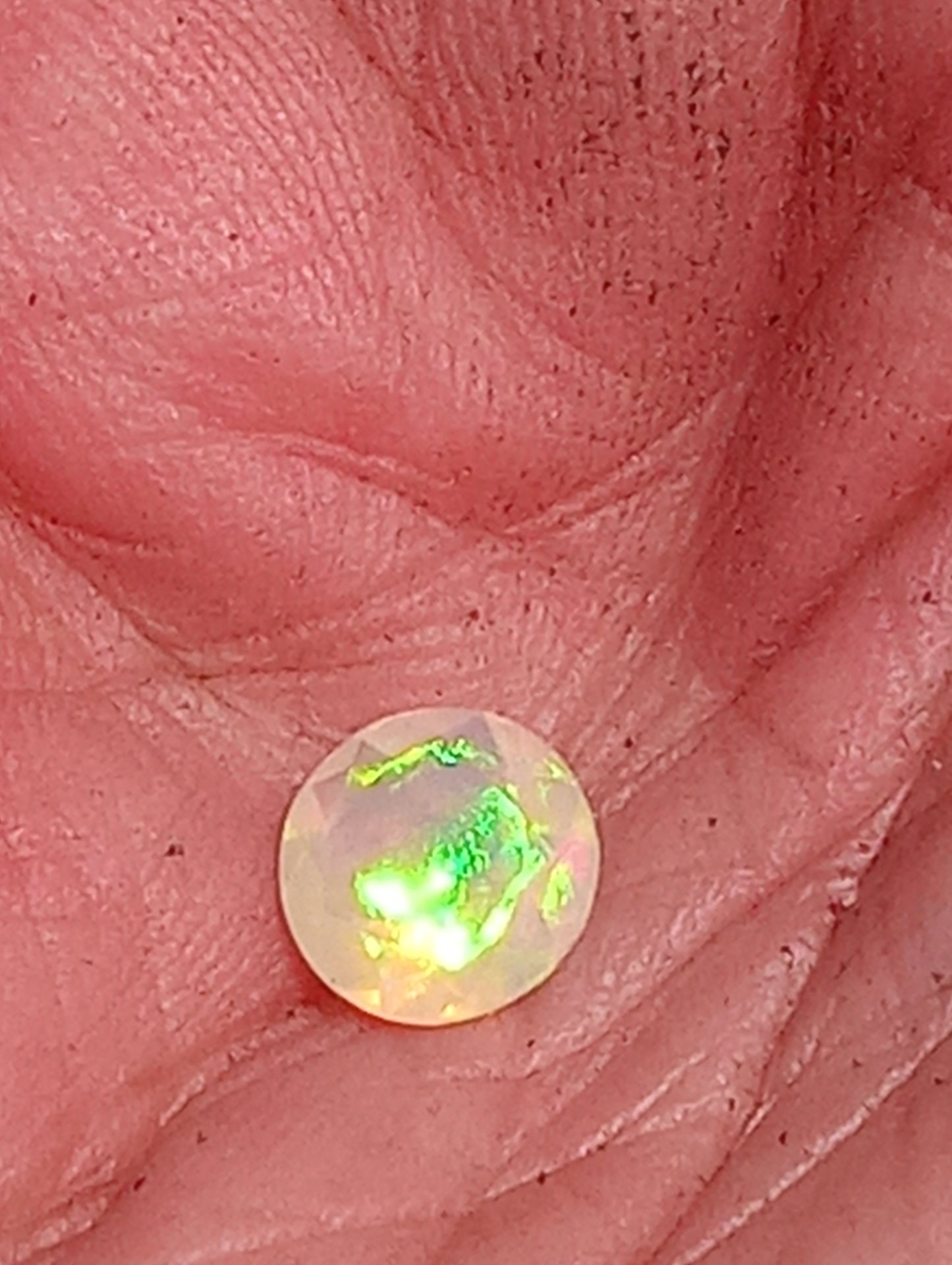 opal gemstones Ethiopian, faqceted, 7mm round cut, .76ct