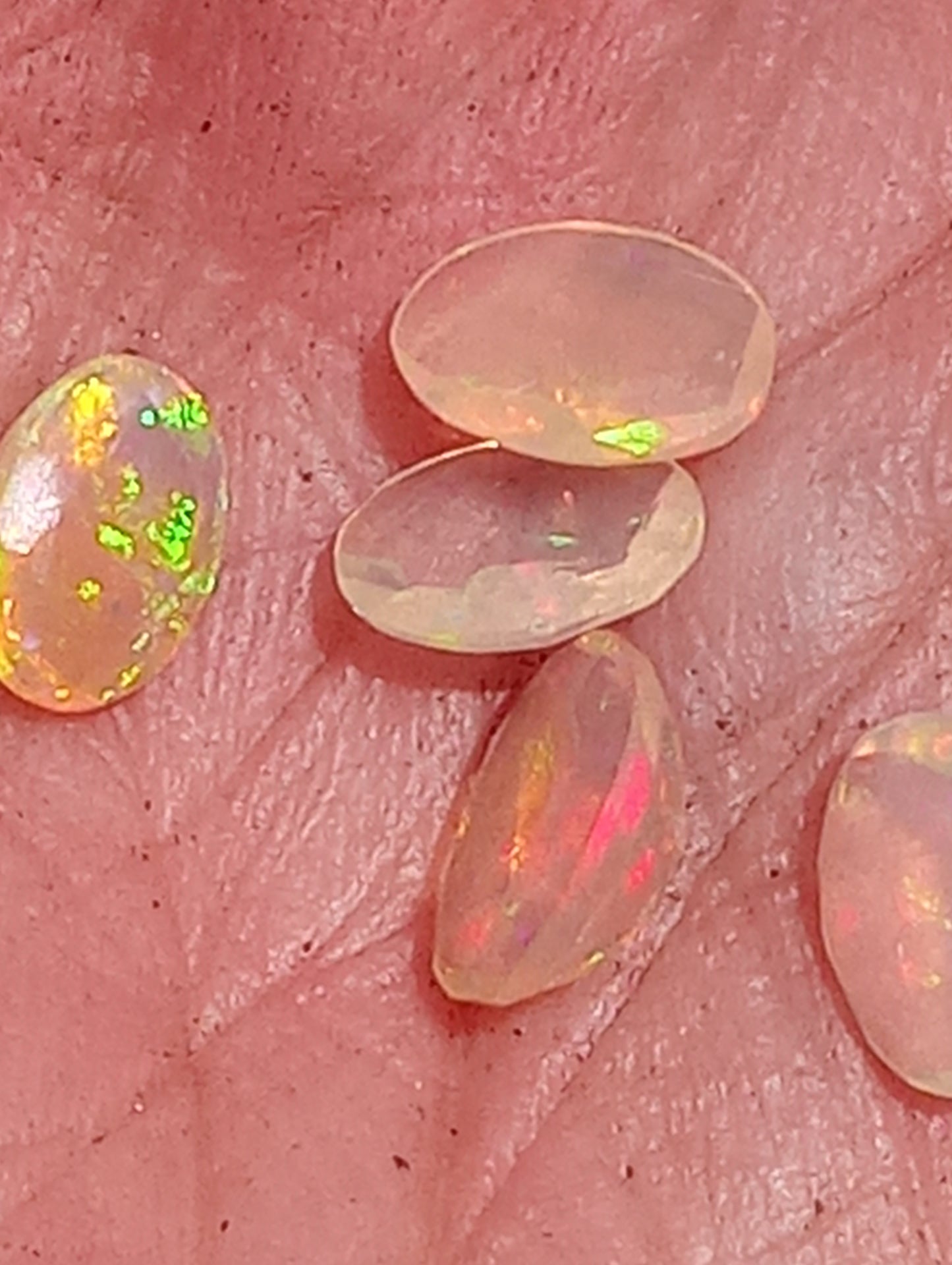 opal gemstone Ethiopian, faceted 7mmx5mm oval cuts, 5 stones