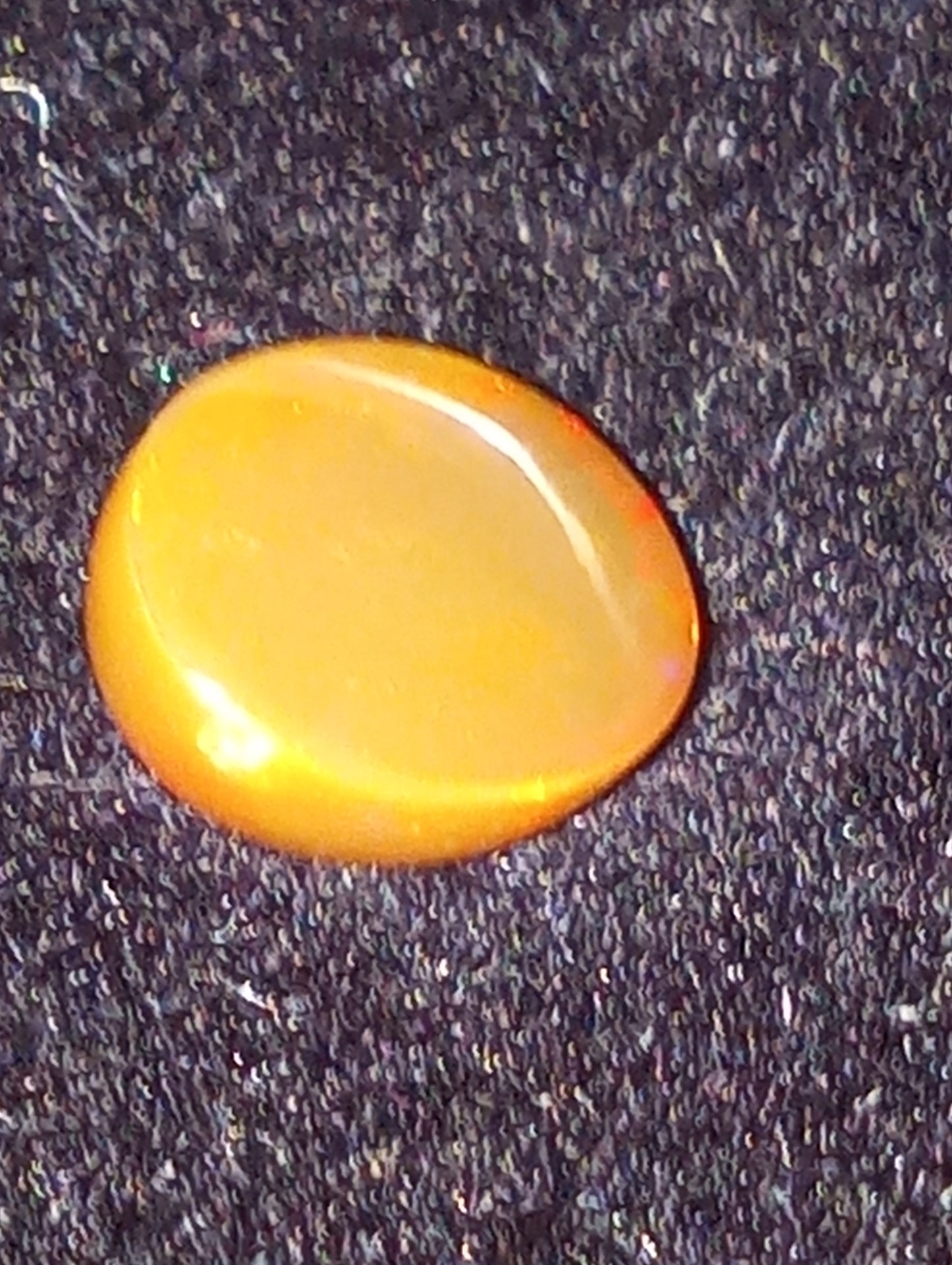 opal gemstone Ethiopian 9mmx7mm oval cab, 1.50ct