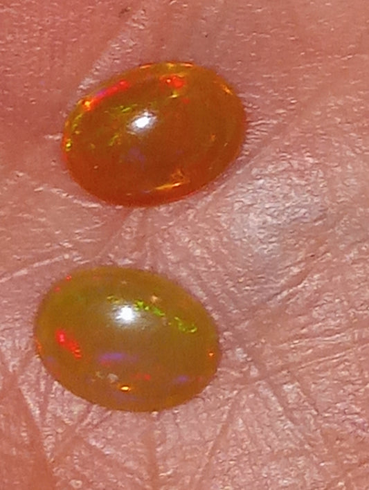 opal Ethiopian , 9mmx7mm cabacons, 2 stones , 1.77ctw
