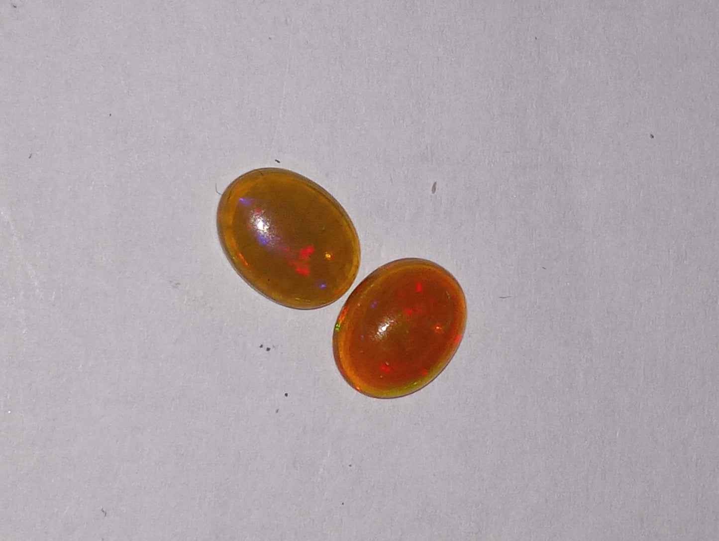 opal Ethiopian , 9mmx7mm cabacons, 2 stones , 1.77ctw