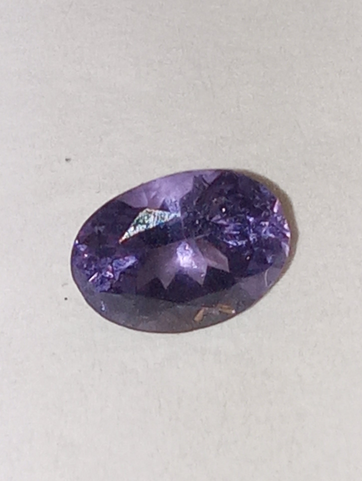 spinel gemstone violet, .63ct, oval cut