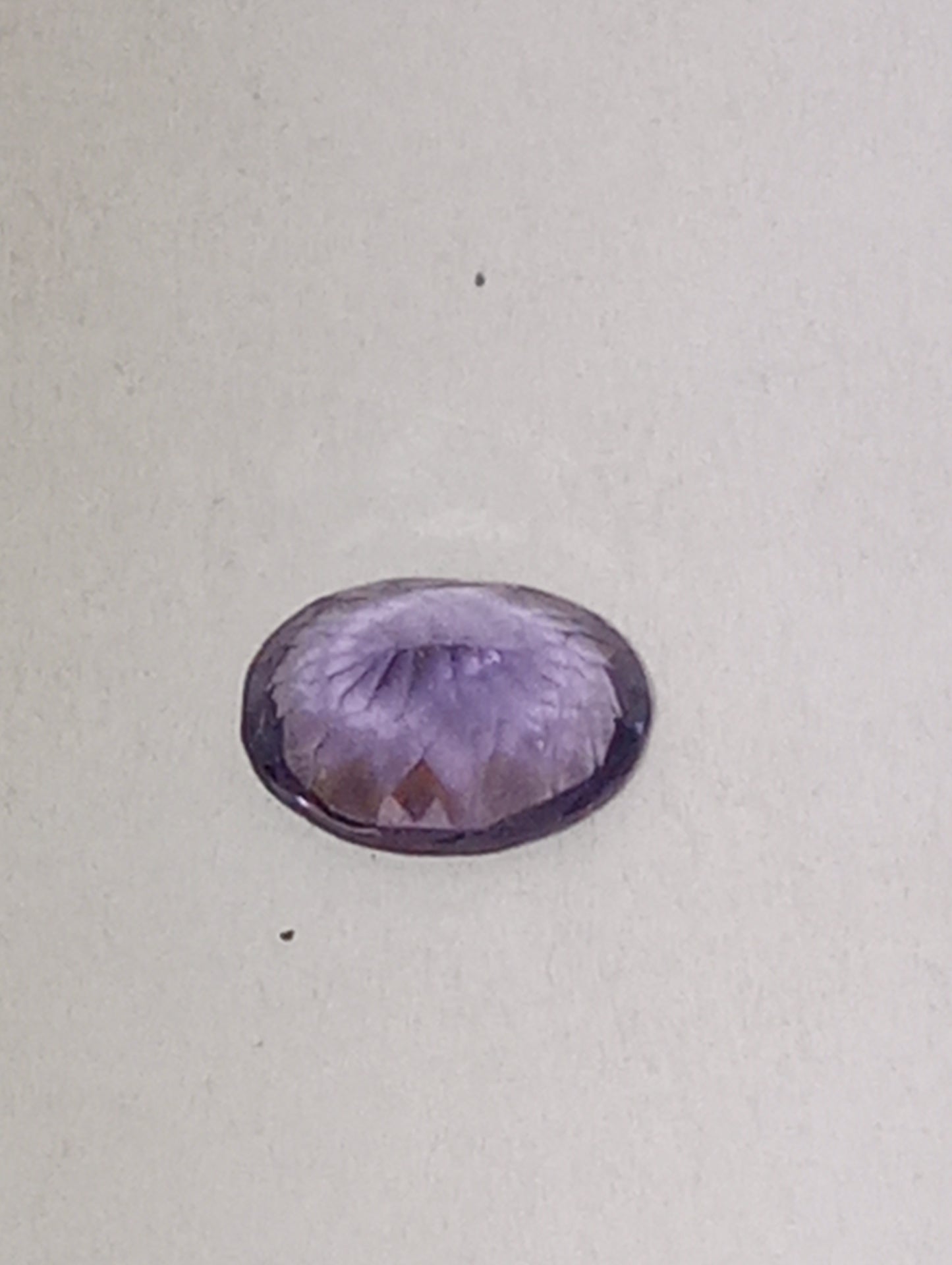 spinel gemstone violet, .63ct, oval cut