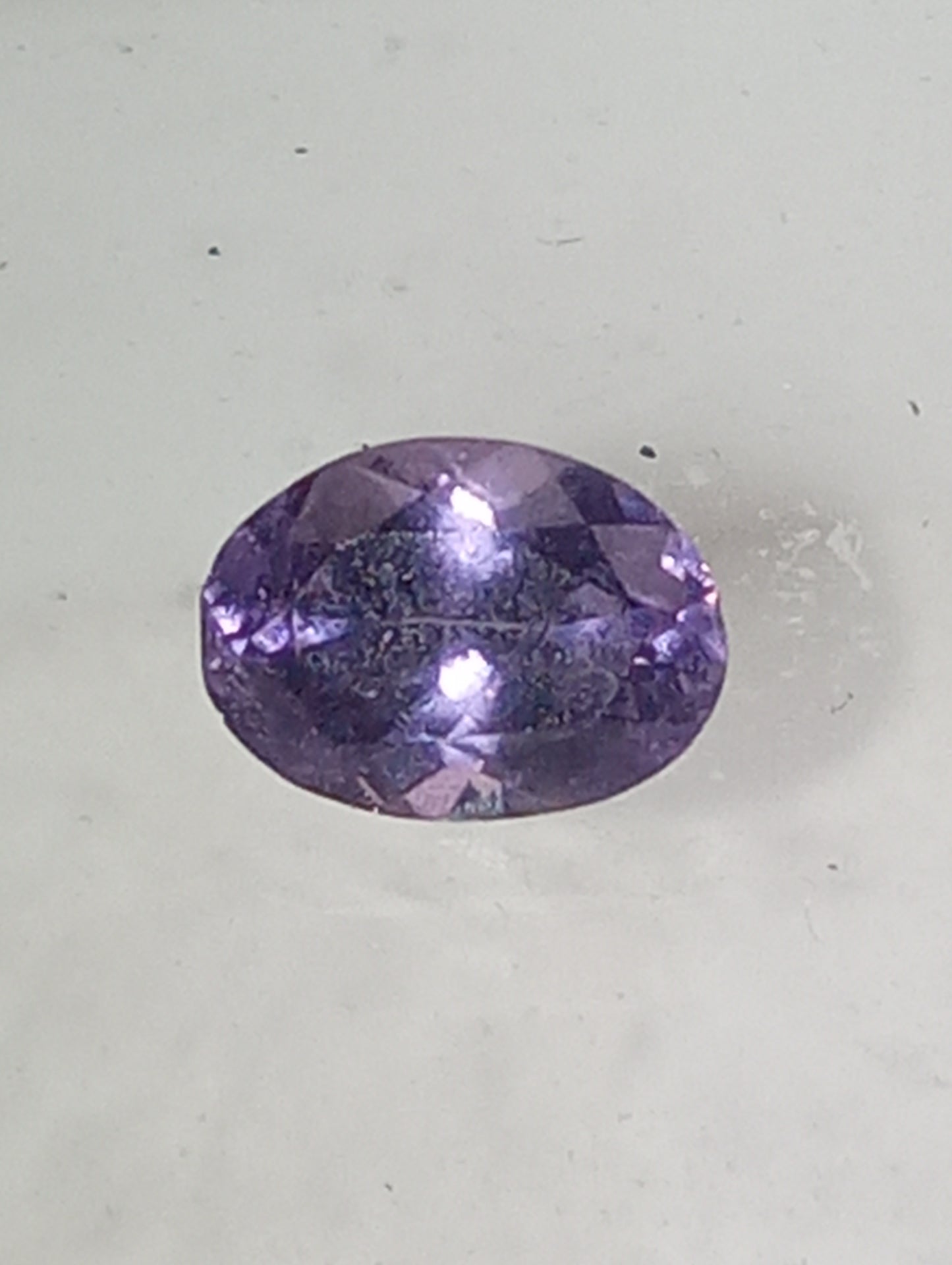 spinel gemstone violet, .63ct, oval cut