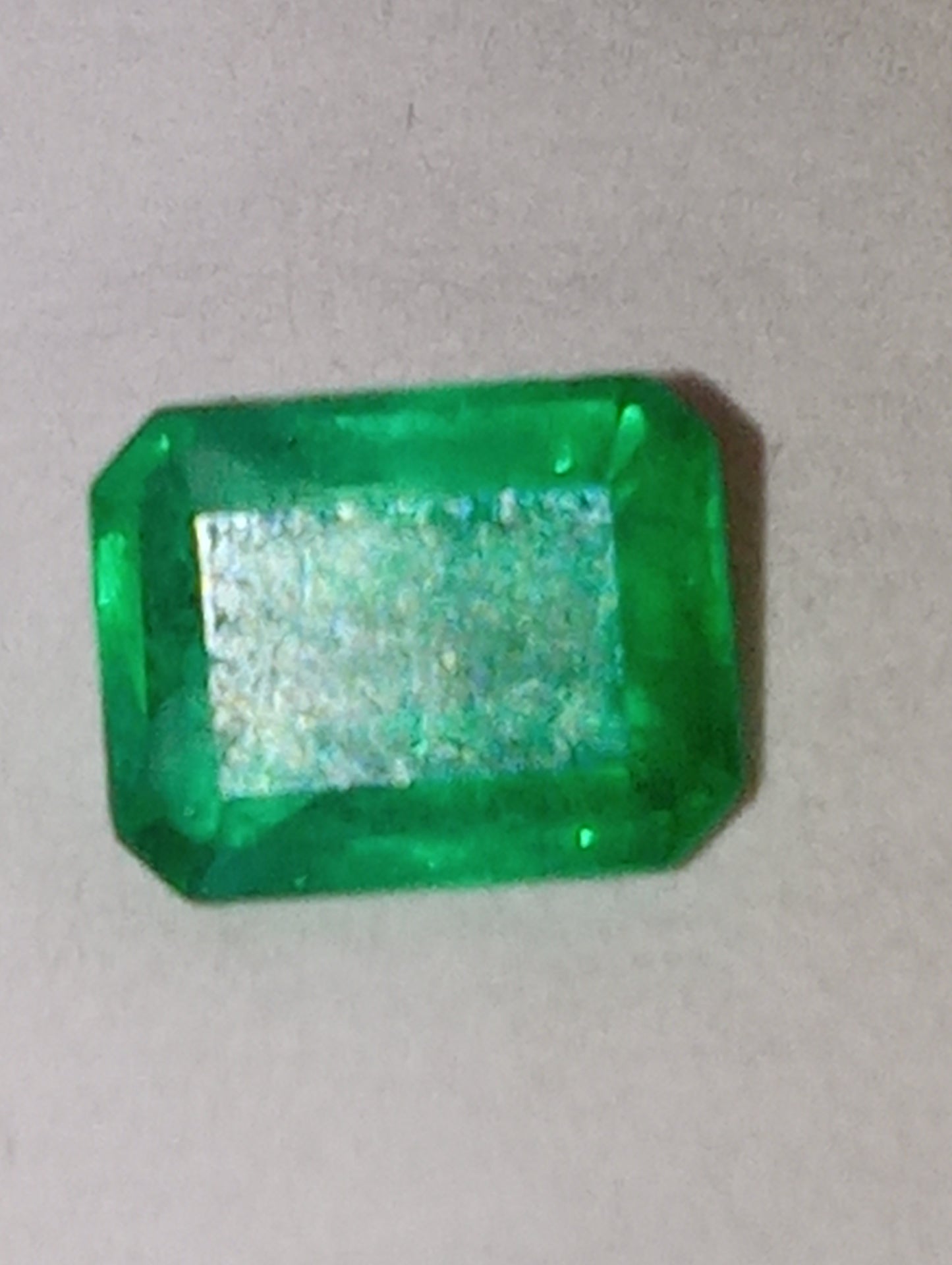 emeraqld gemstone Colombian, 6.5mmx5mm emerald cut, .86ct