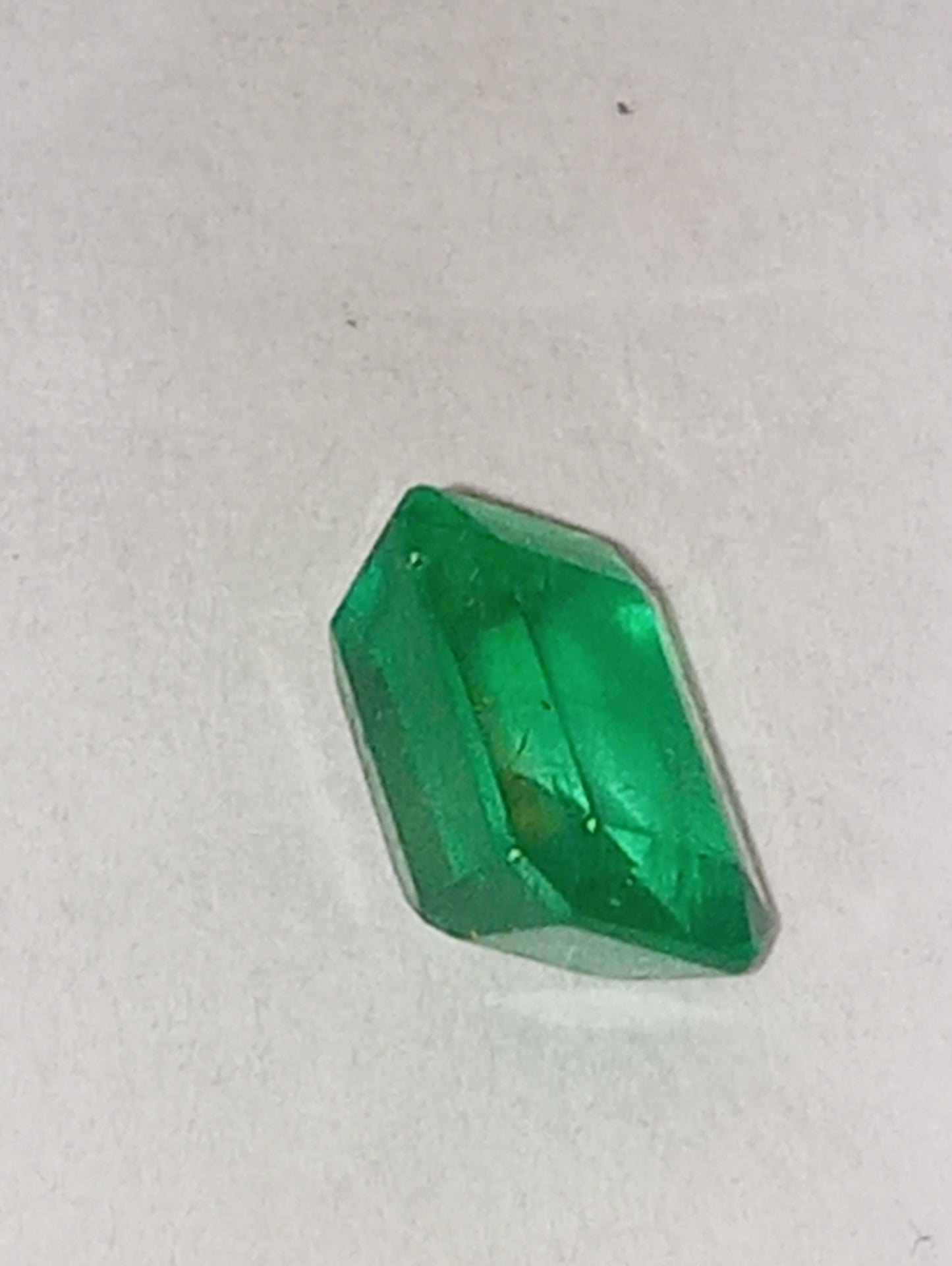 emeraqld gemstone Colombian, 6.5mmx5mm emerald cut, .86ct