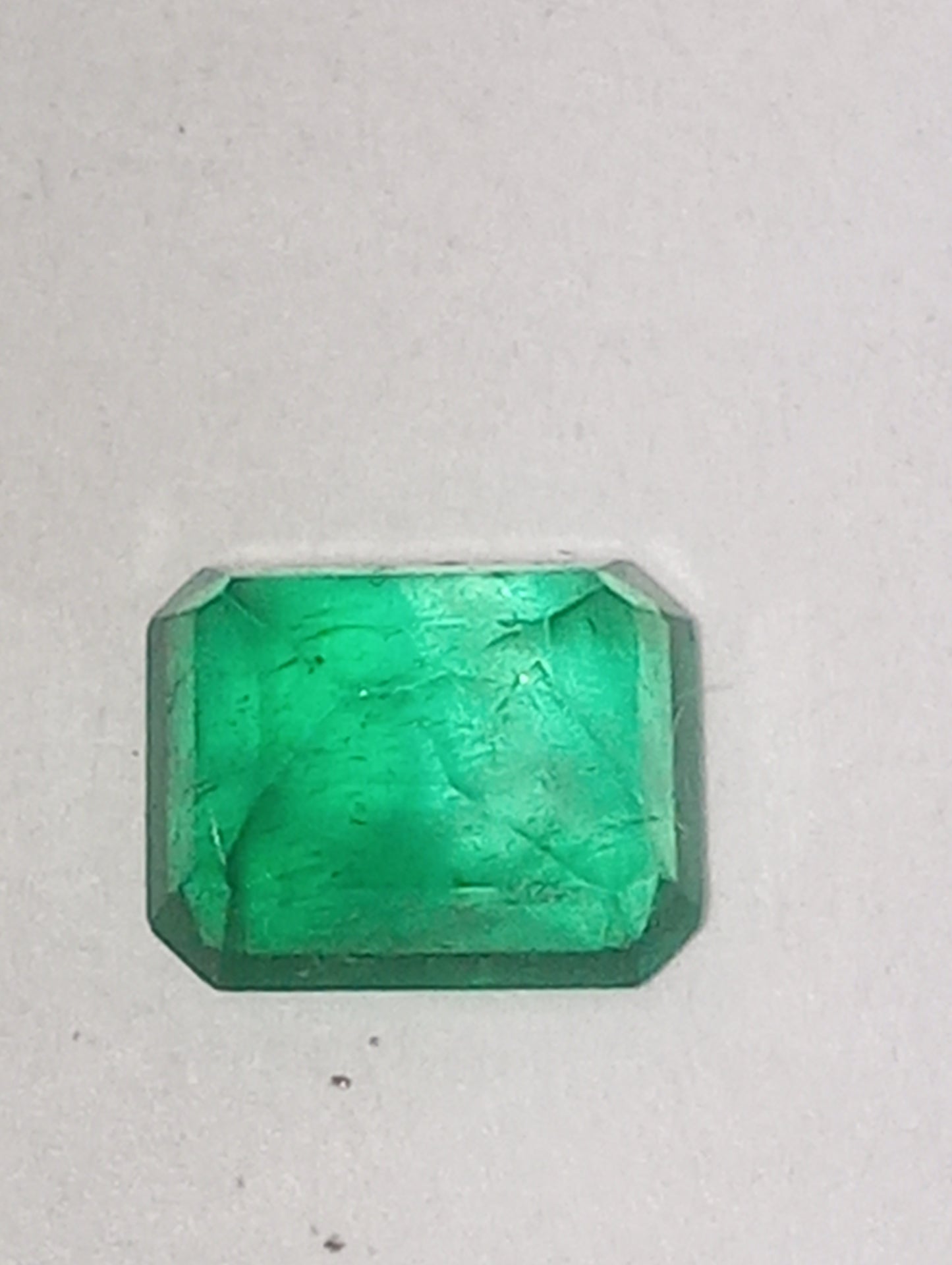 emeraqld gemstone Colombian, 6.5mmx5mm emerald cut, .86ct