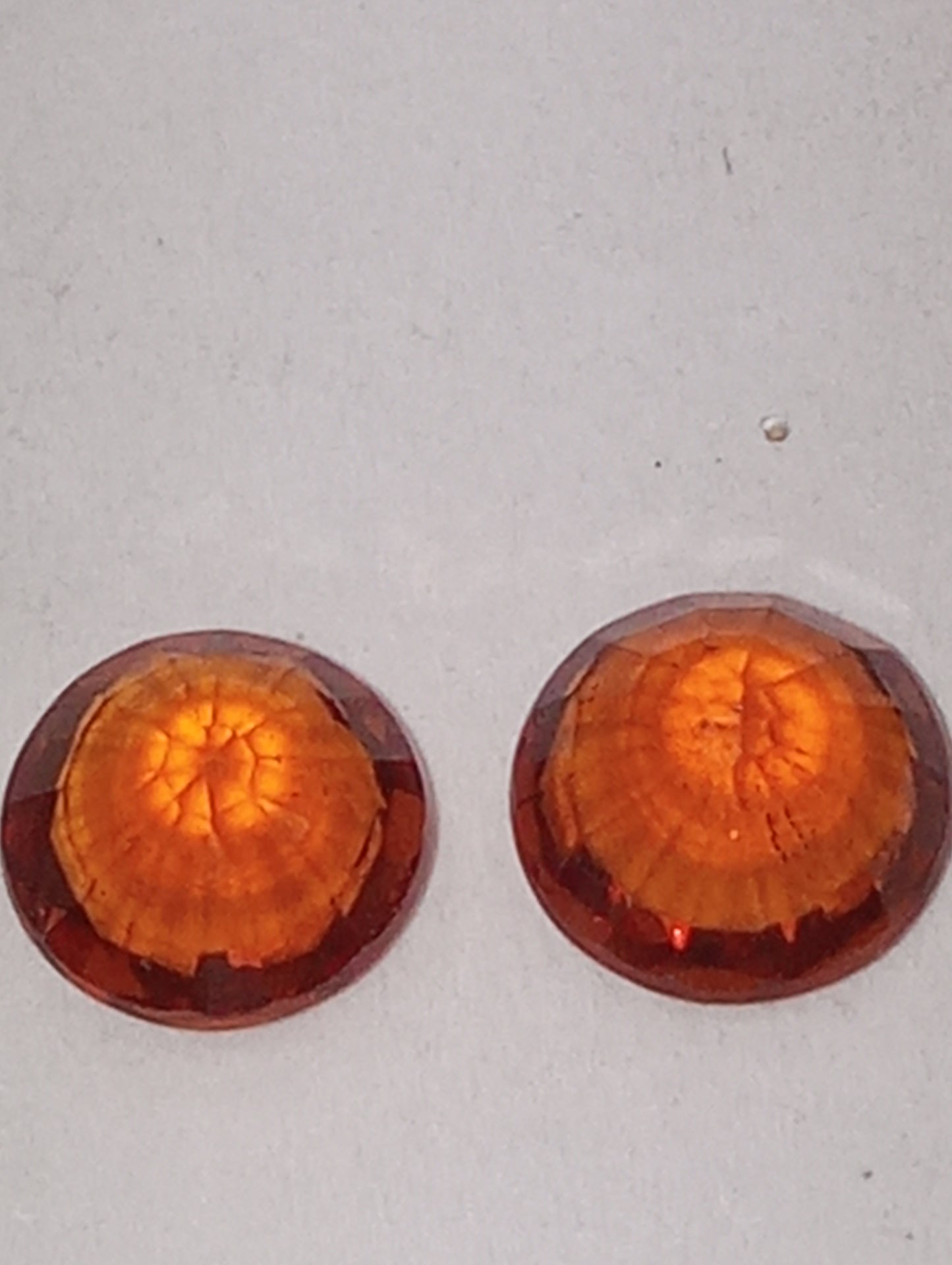 garnet gemstones, mandarin spessartite, 5mm round cuts, 2 stones, 1.36ctw