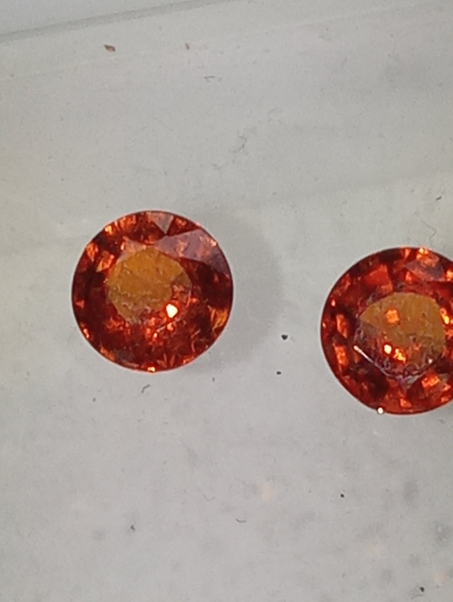 garnet gemstones, mandarin spessartite, 5mm round cuts, 2 stones, 1.36ctw