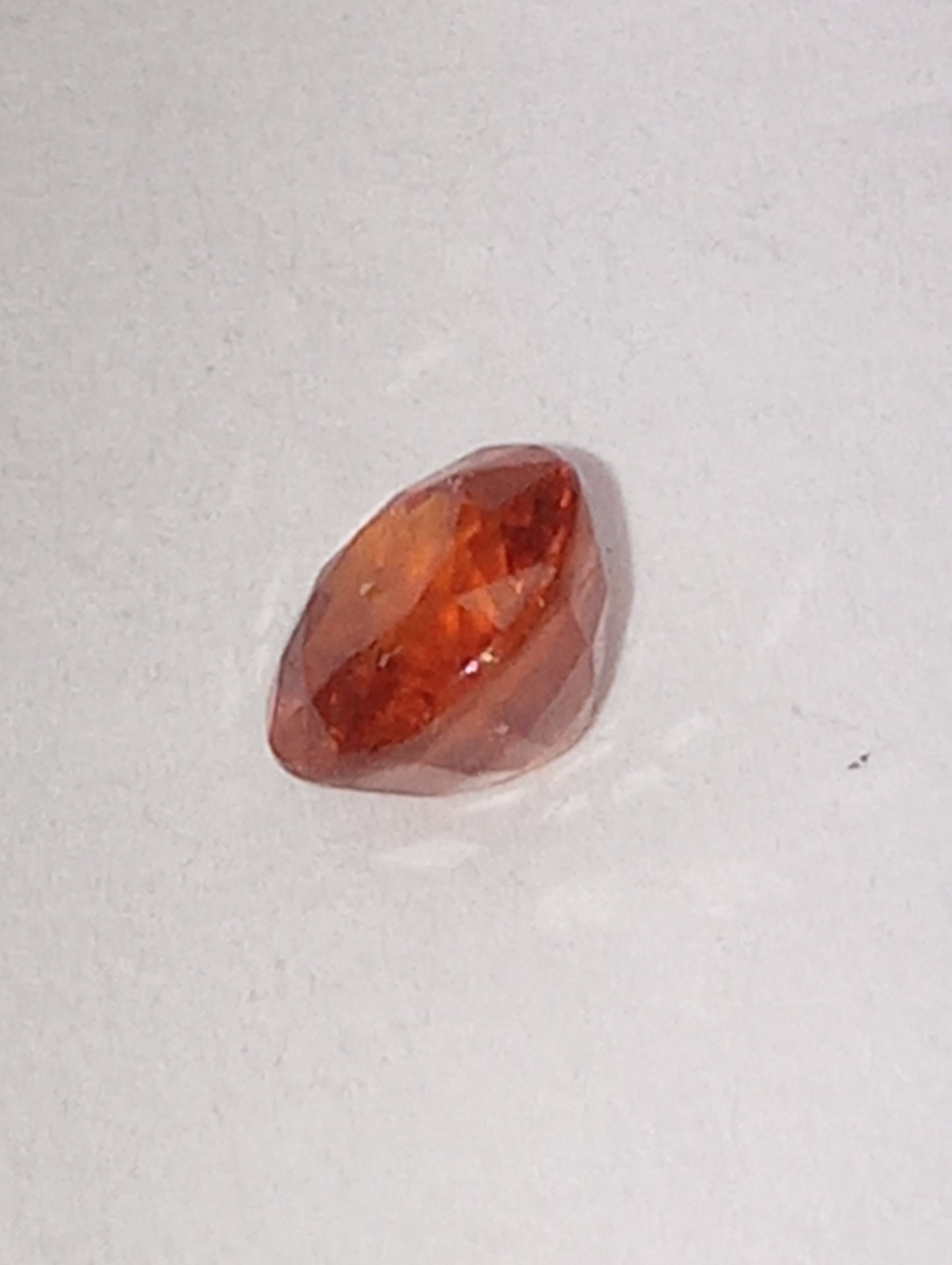 garnet gemstone Mandarin spessartite, 5mm round cut, .68ct