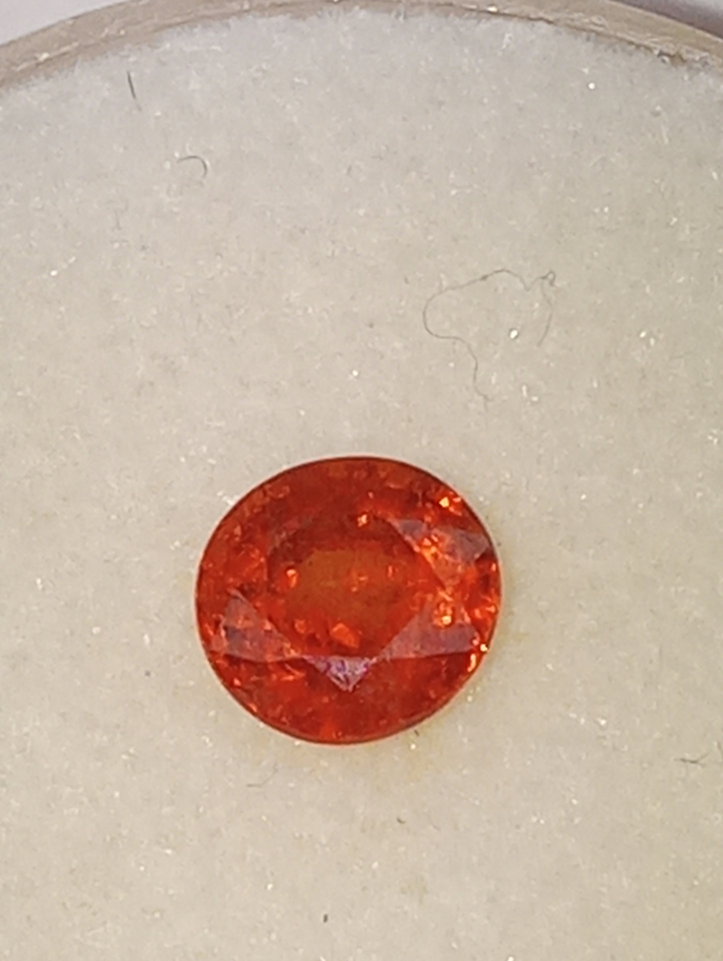 garnet gemstone Mandarin spessartite, 5mm round cut, .68ct
