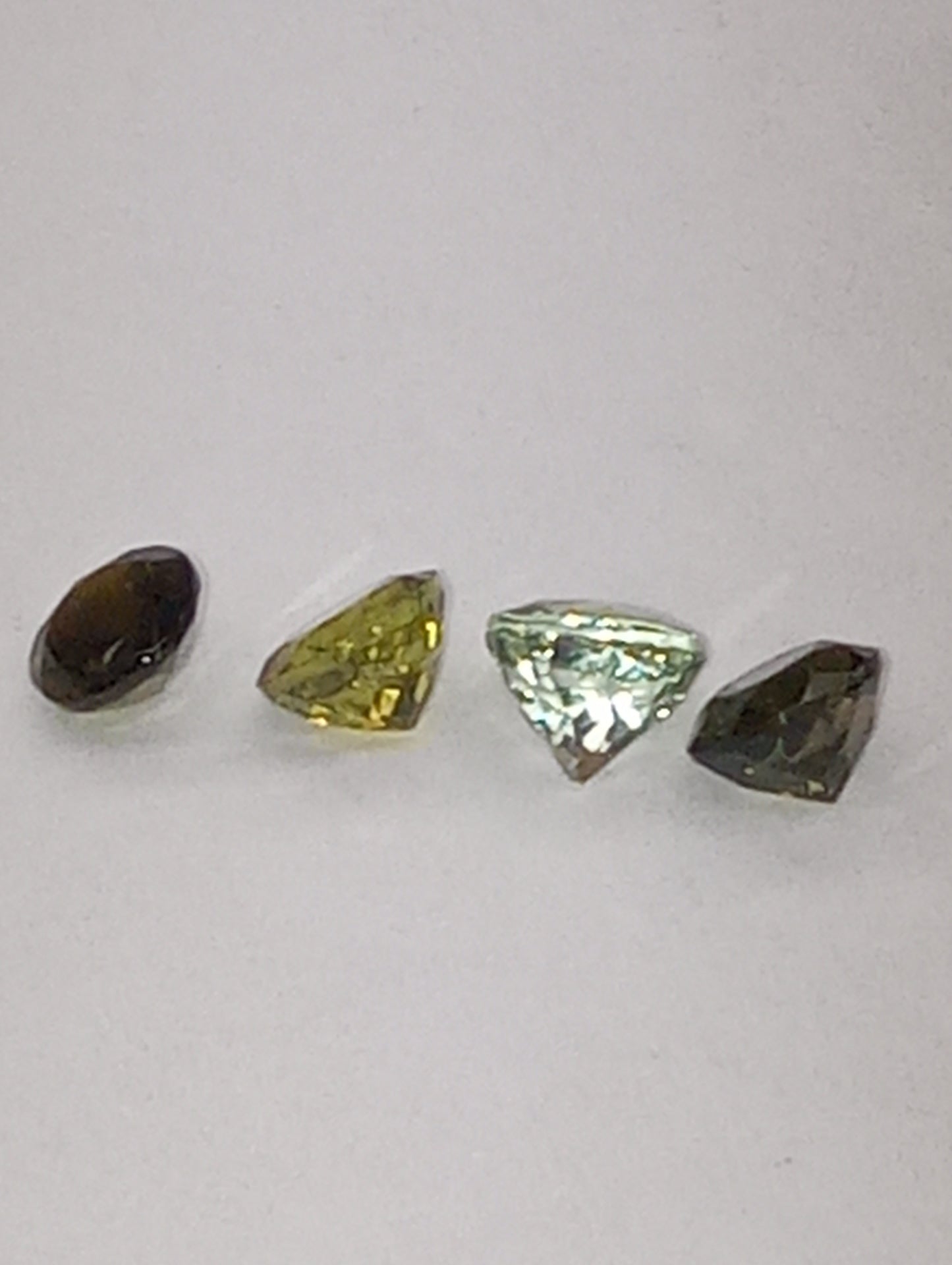 tourmaline gemstones, green shades, 5mm round cuts, 4 stones, 2.20ctw