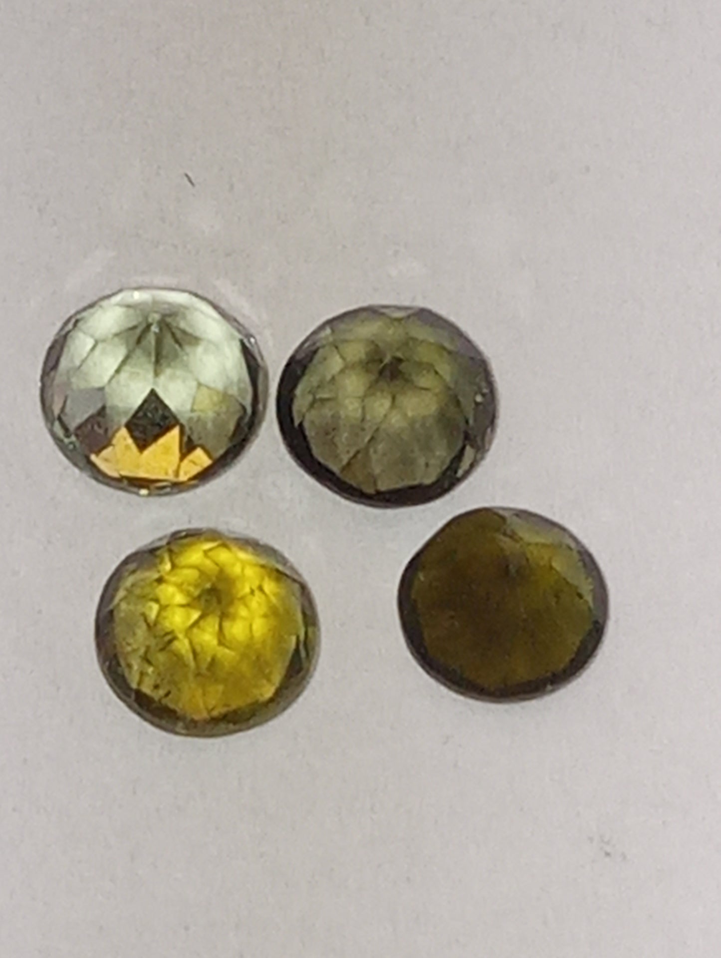 tourmaline gemstones, green shades, 5mm round cuts, 4 stones, 2.20ctw