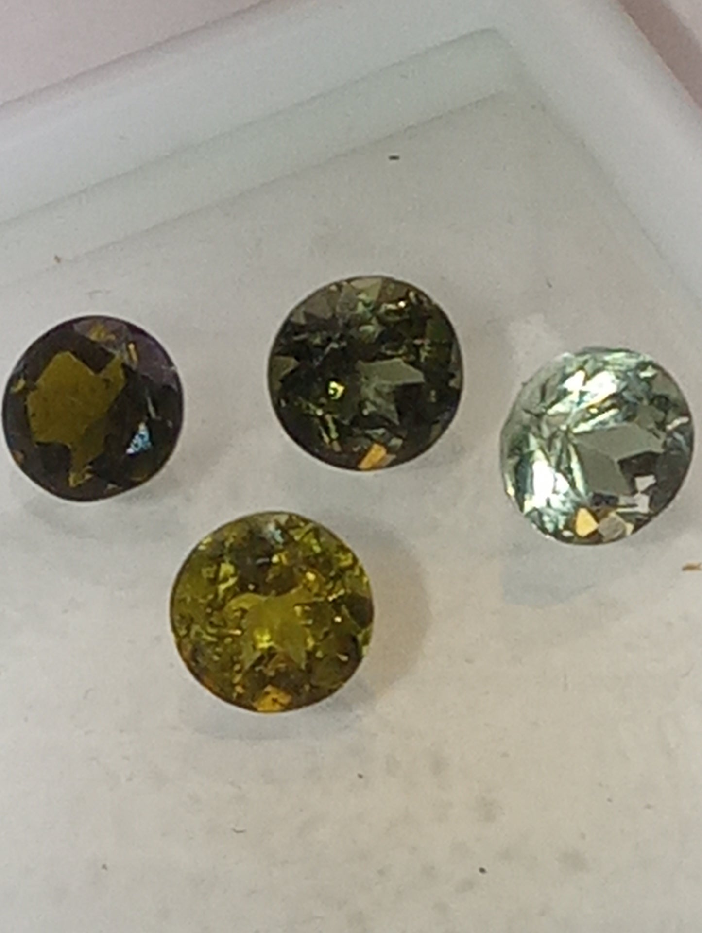 tourmaline gemstones, green shades, 5mm round cuts, 4 stones, 2.20ctw