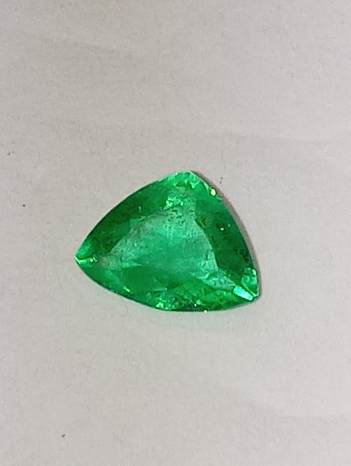 emerald gemstone Colombian, .57ct fancy trillion cut