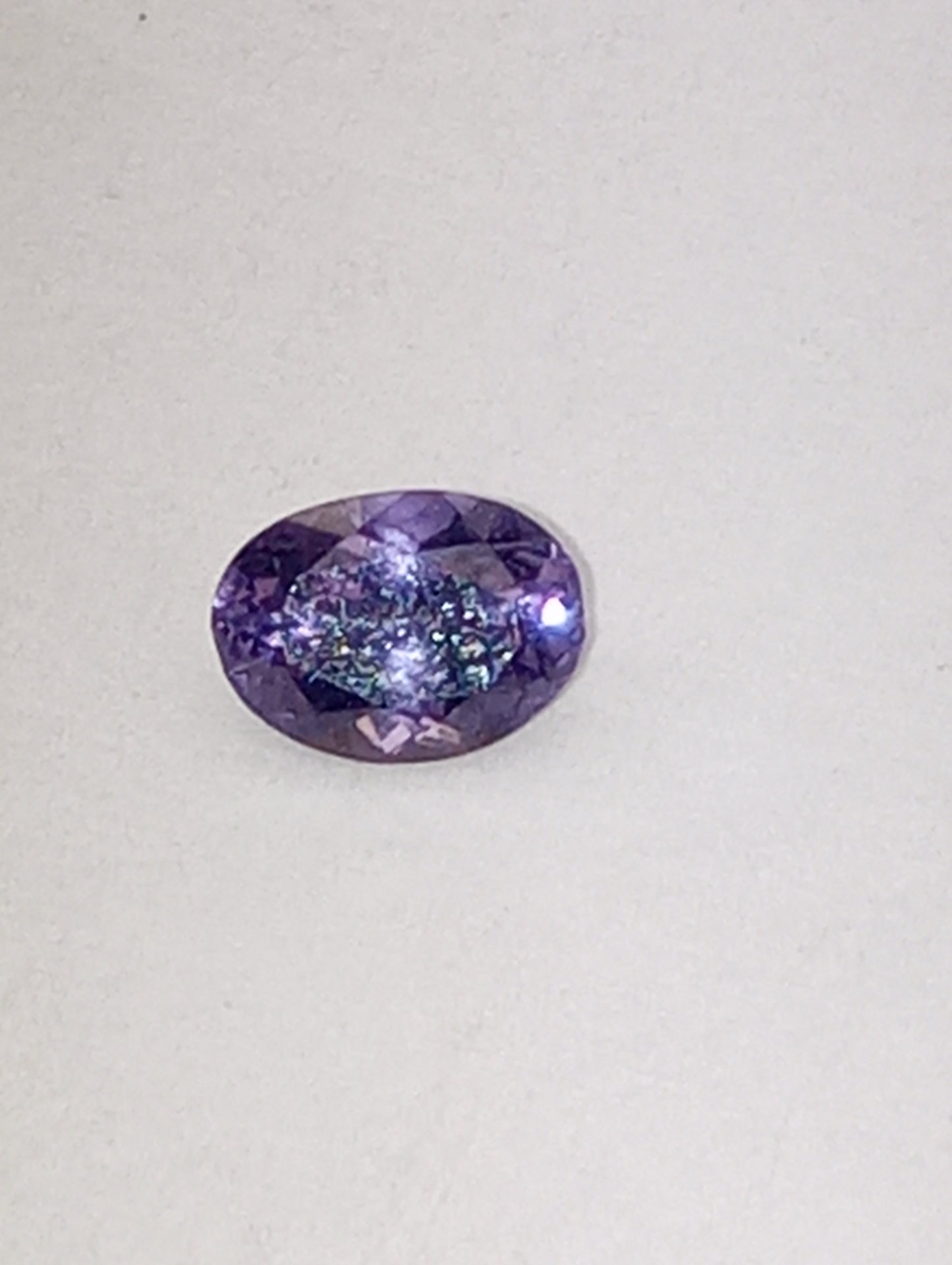 spinel gemstone violet, .63ct, oval cut