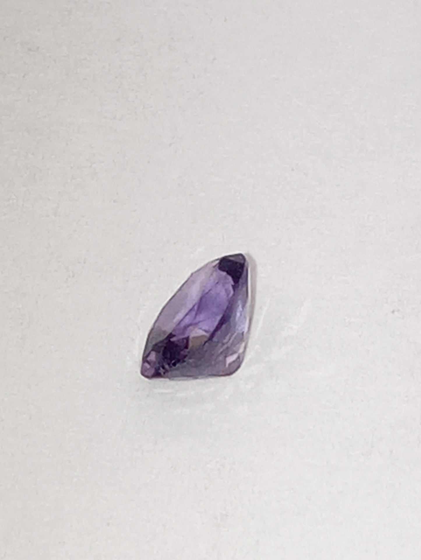spinel gemstone violet, .63ct, oval cut