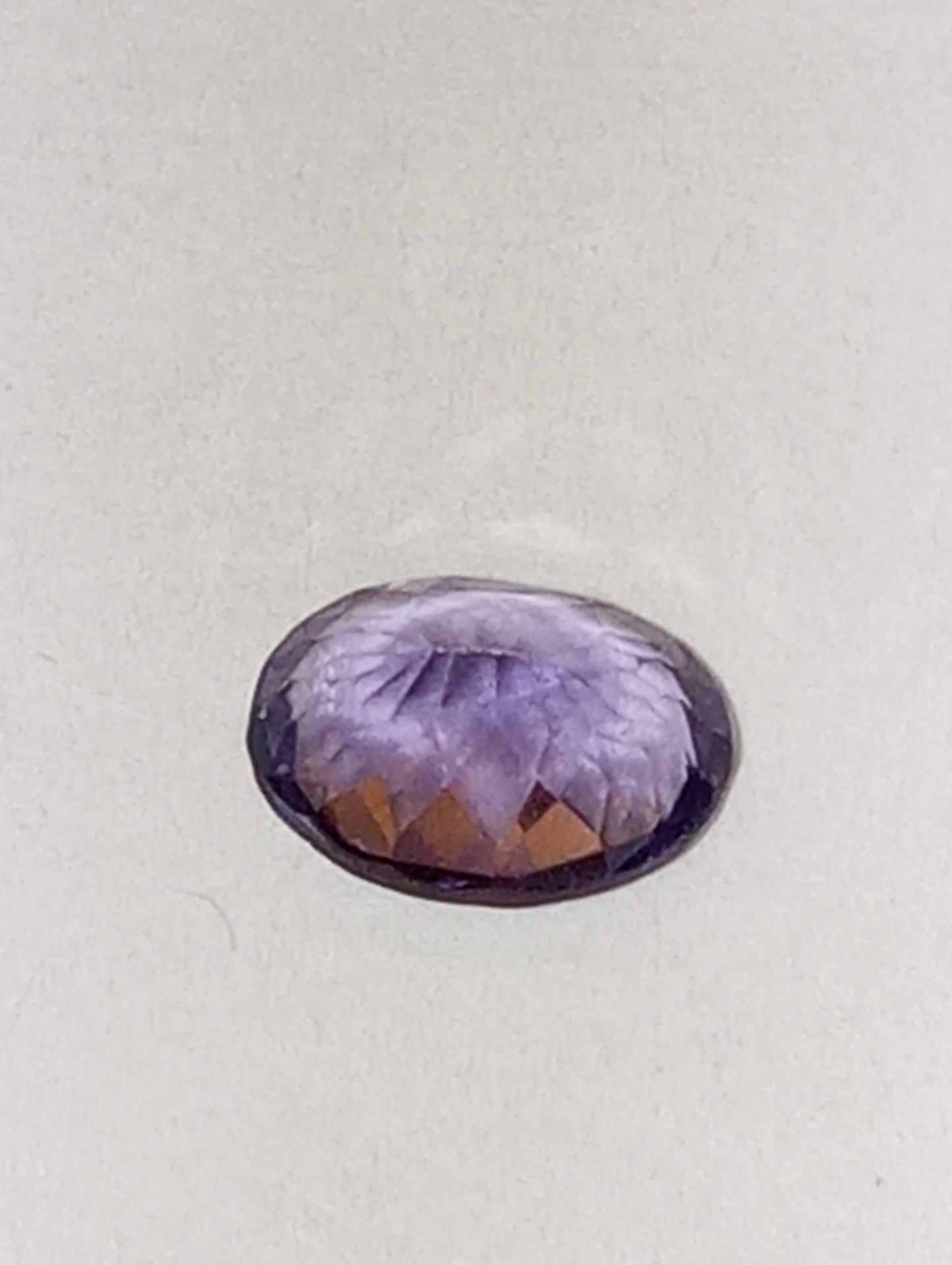spinel gemstone violet, .63ct, oval cut