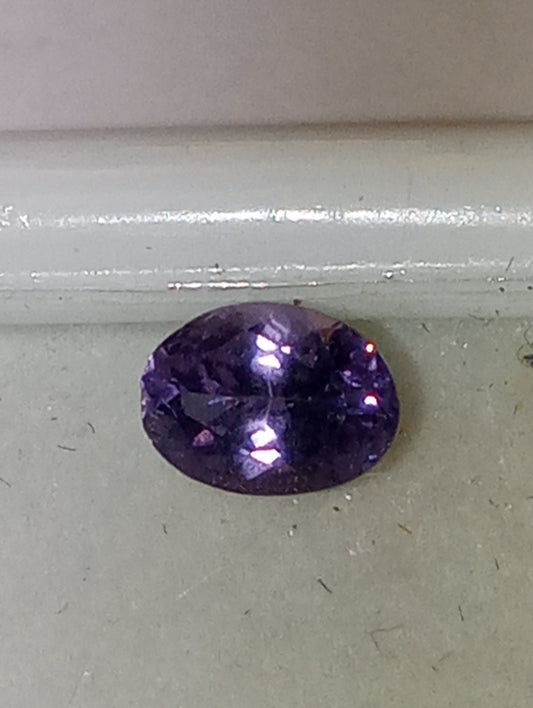spinel gemstone violet, .63ct, oval cut