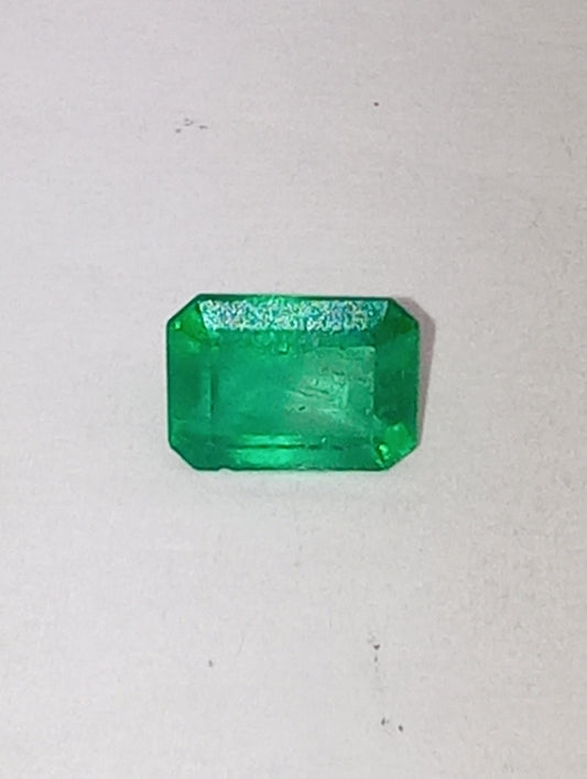 emeraqld gemstone Colombian, 6.5mmx5mm emerald cut, .86ct