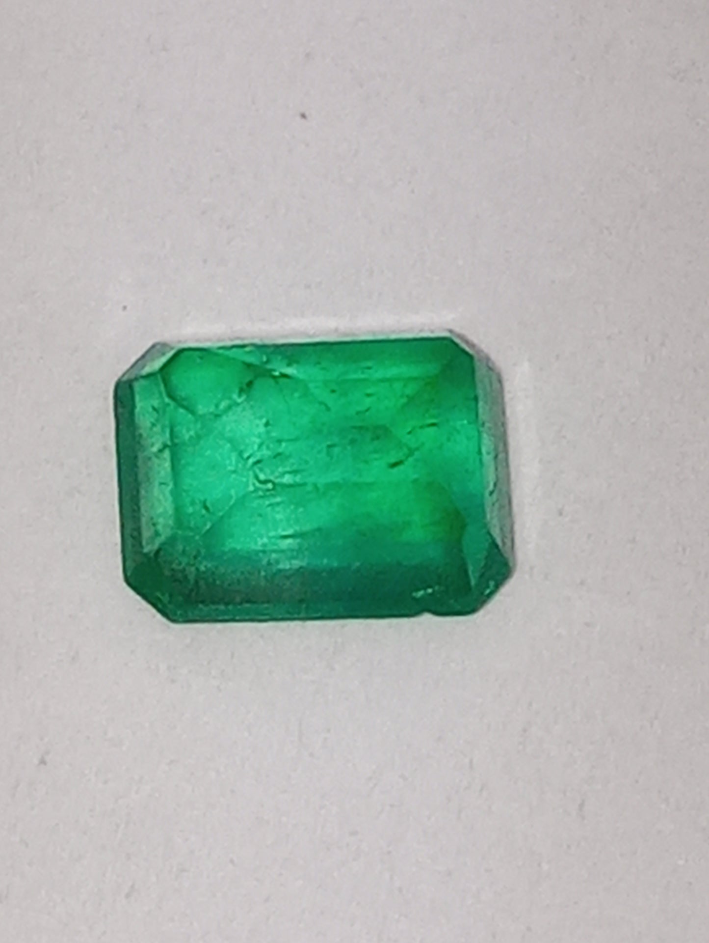emeraqld gemstone Colombian, 6.5mmx5mm emerald cut, .86ct