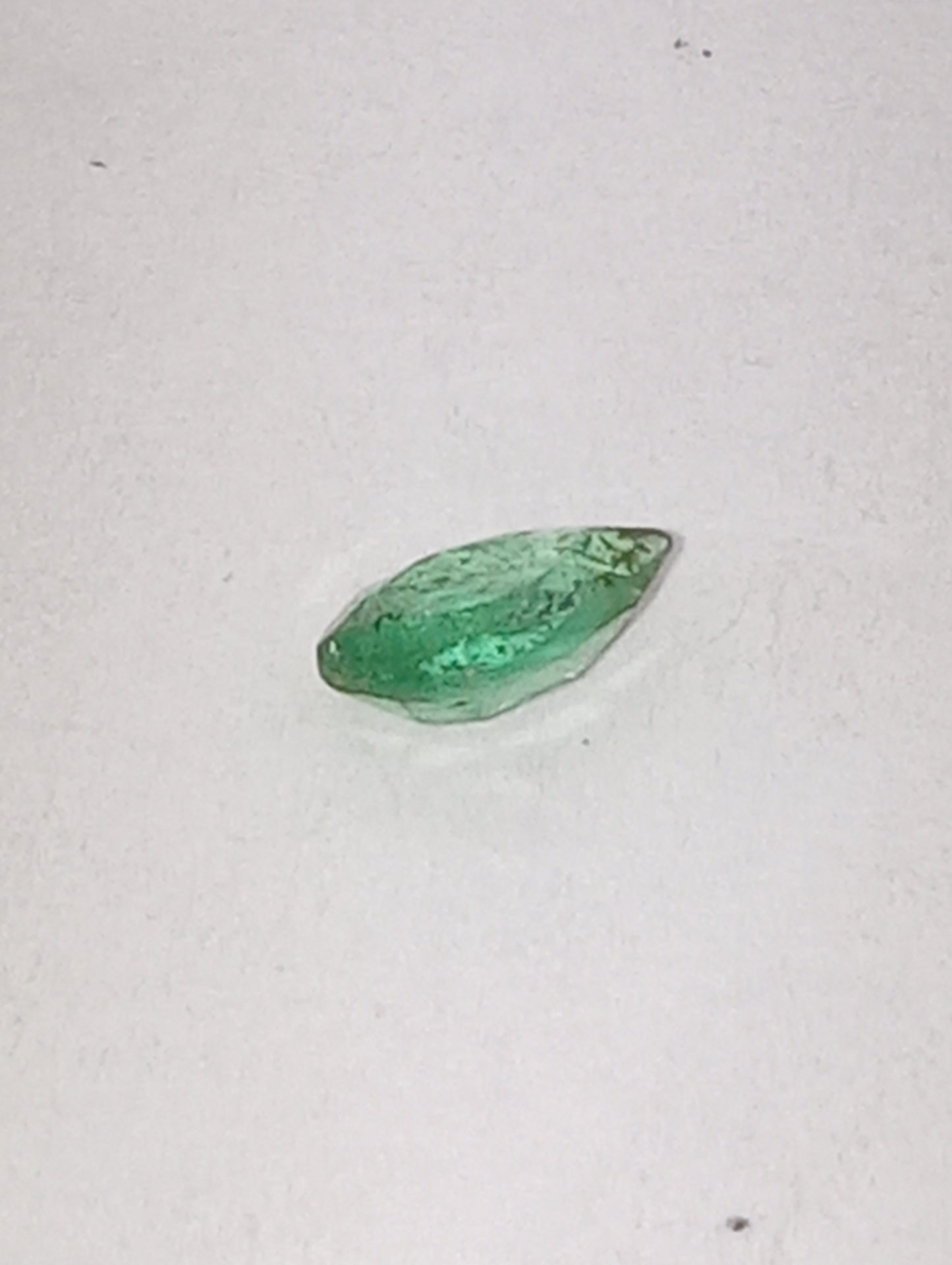 emerald gemstone Nigerian, 5.2x4mm pear cut, .24ct
