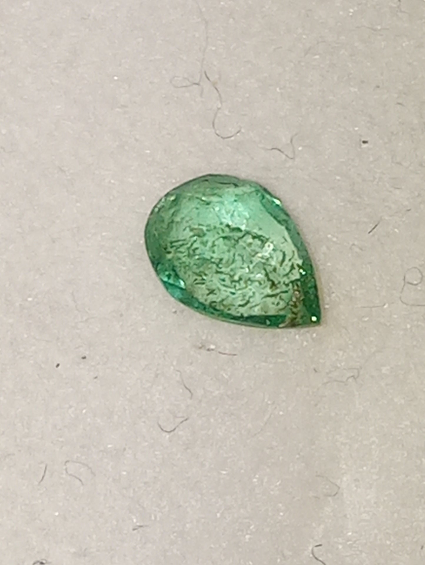 emerald gemstone Nigerian, 5.2x4mm pear cut, .24ct