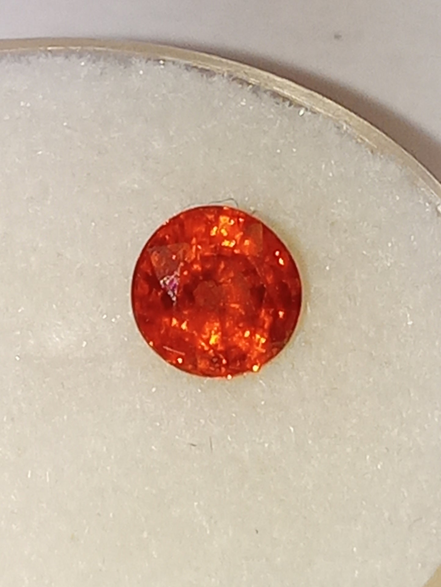 garnet gemstone Mandarin spessartite, 5mm round cut, .68ct
