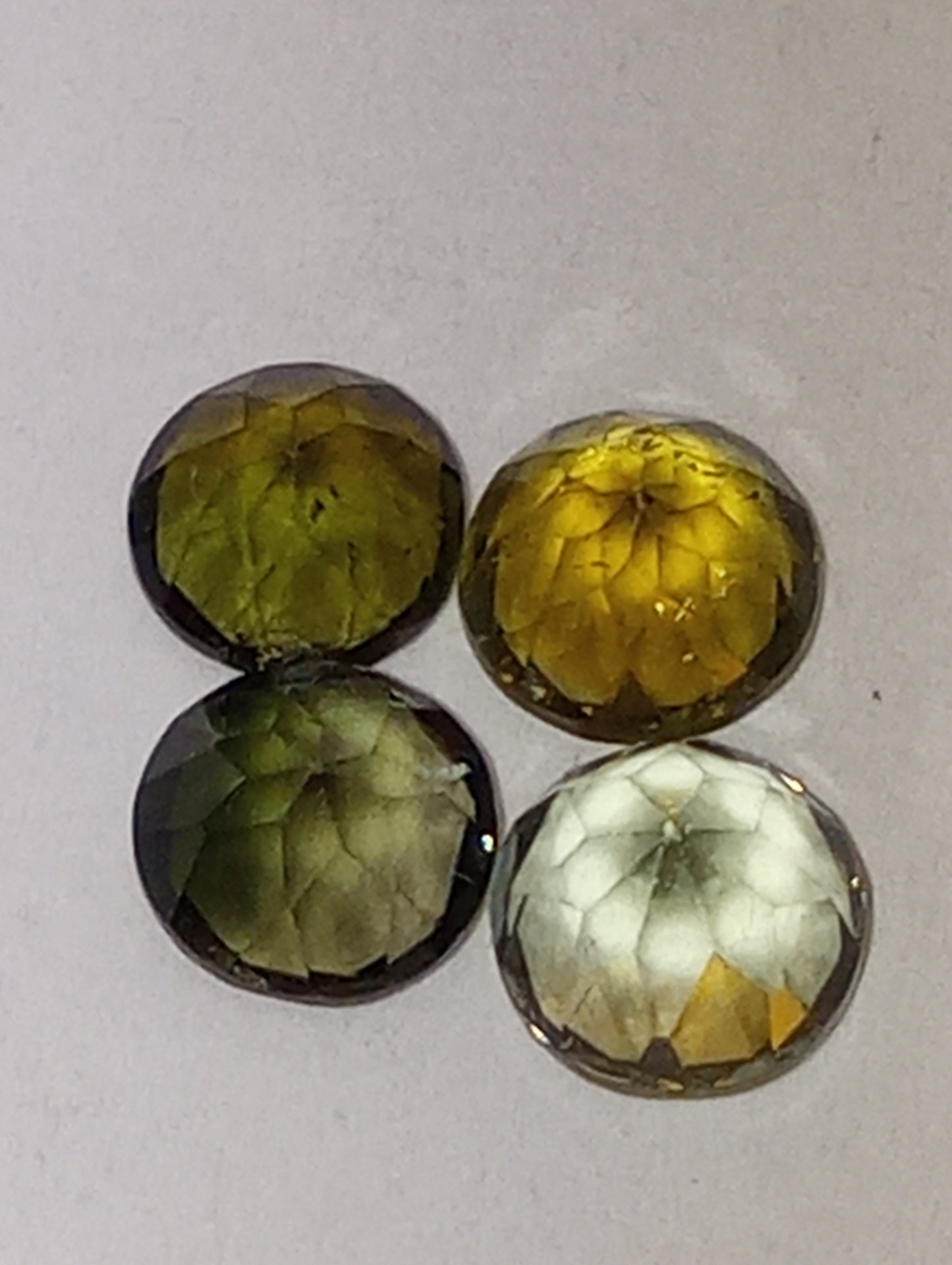 tourmaline gemstones, green shades, 5mm round cuts, 4 stones, 2.20ctw
