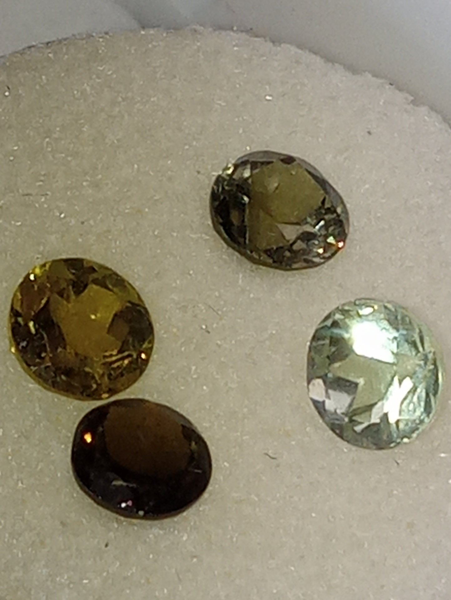 tourmaline gemstones, green shades, 5mm round cuts, 4 stones, 2.20ctw