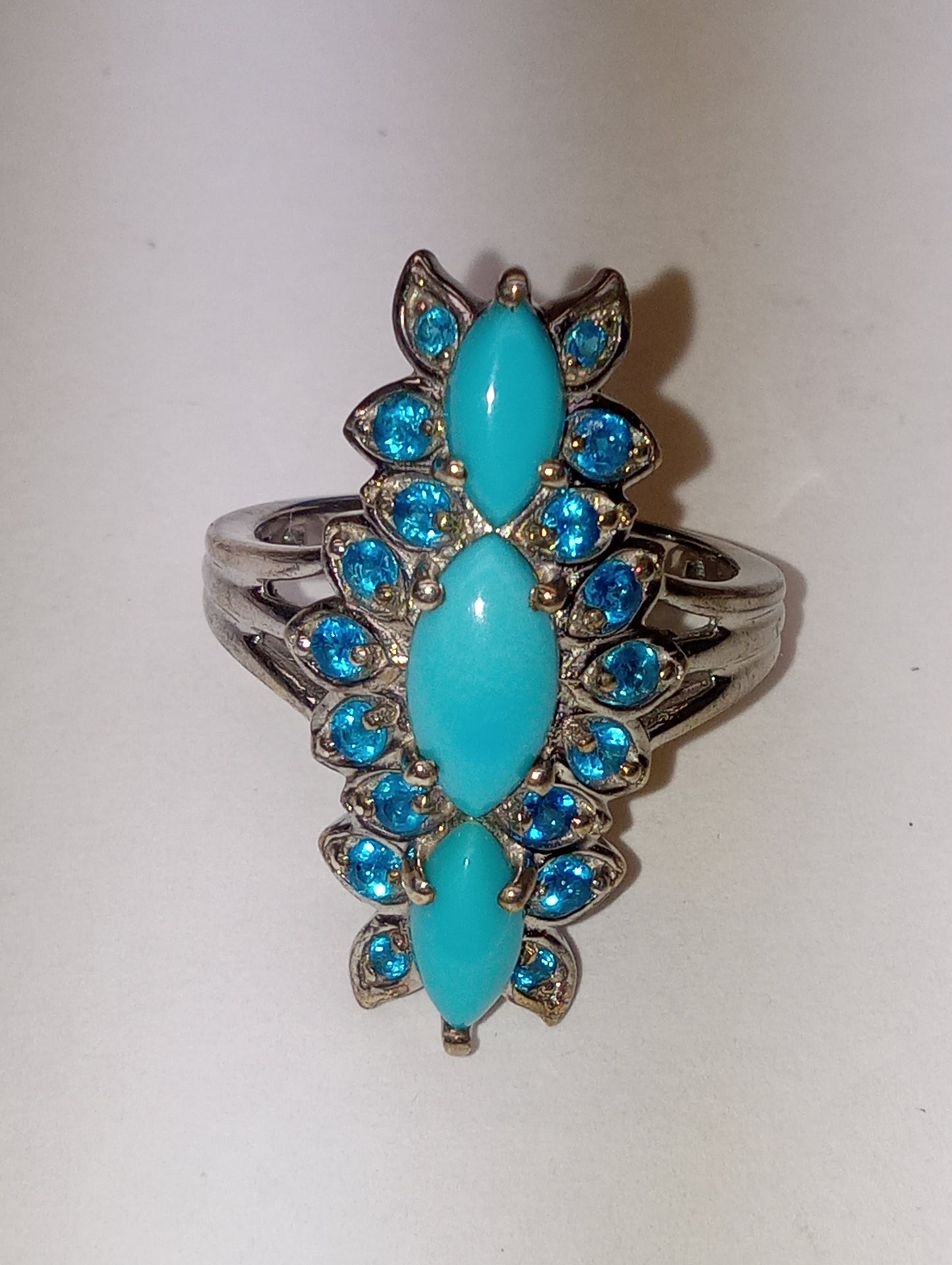ring Sleeping Beauty turquoise, elongated floral in platinum over sterling silver, sioze 8, 2.50ctw