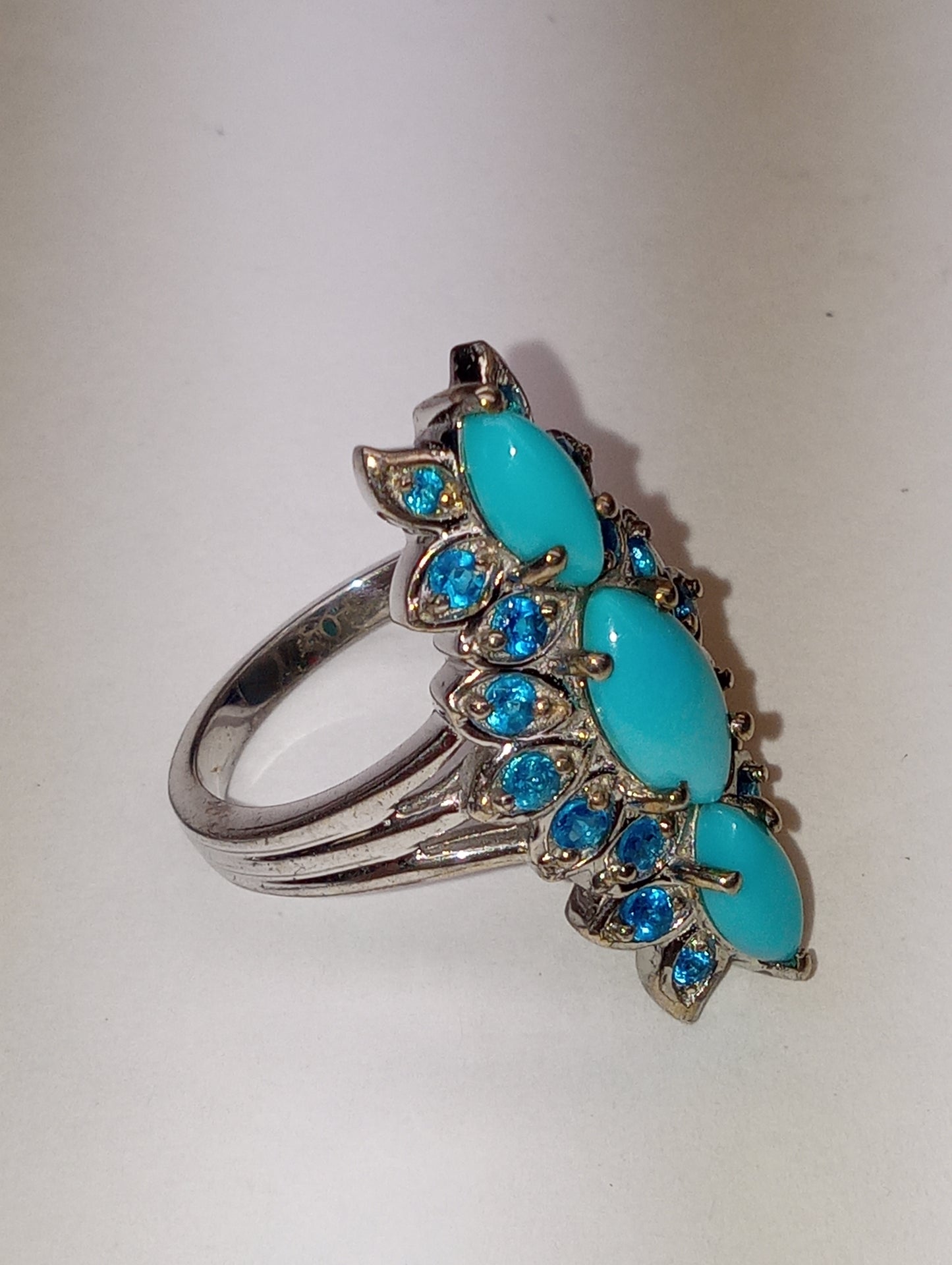 ring Sleeping Beauty turquoise, elongated floral in platinum over sterling silver, sioze 8, 2.50ctw