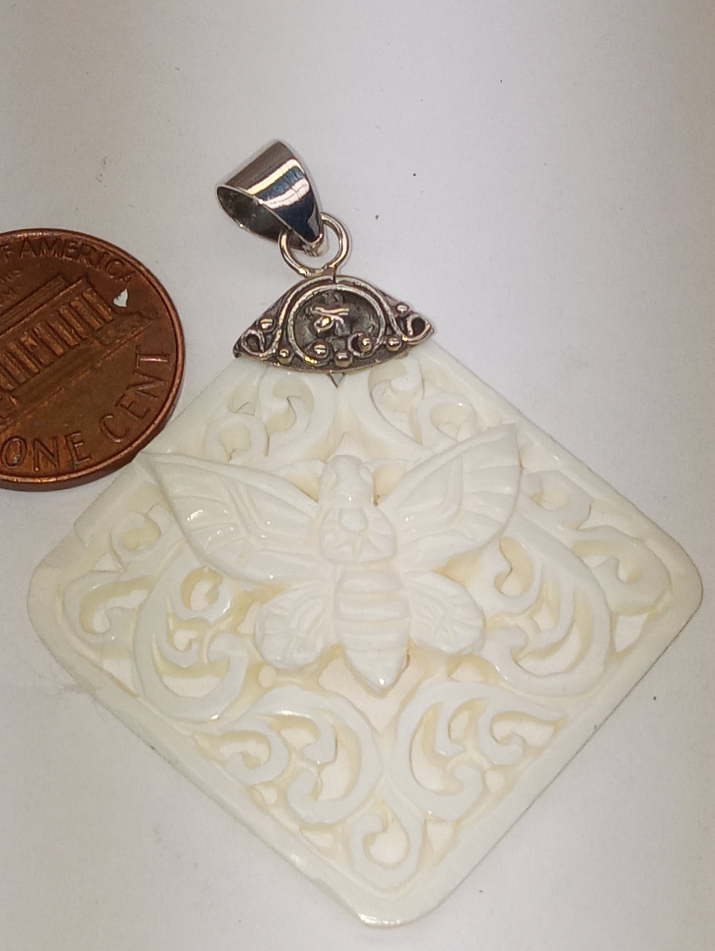 pendant bone carved butterfly in sterling silver