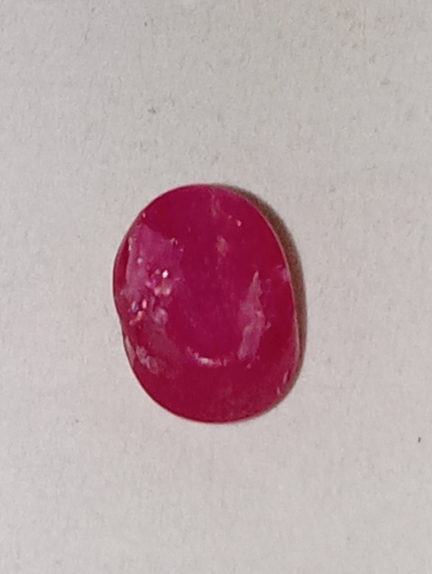 ruby gemstone Burma star, .92ct, 5.5mmx4mm oval cabocon,