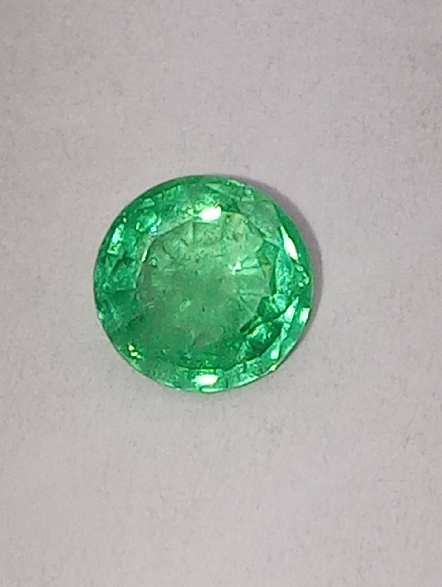 emerald gemstone Nigerian, 5.5mm round cut, .60ct