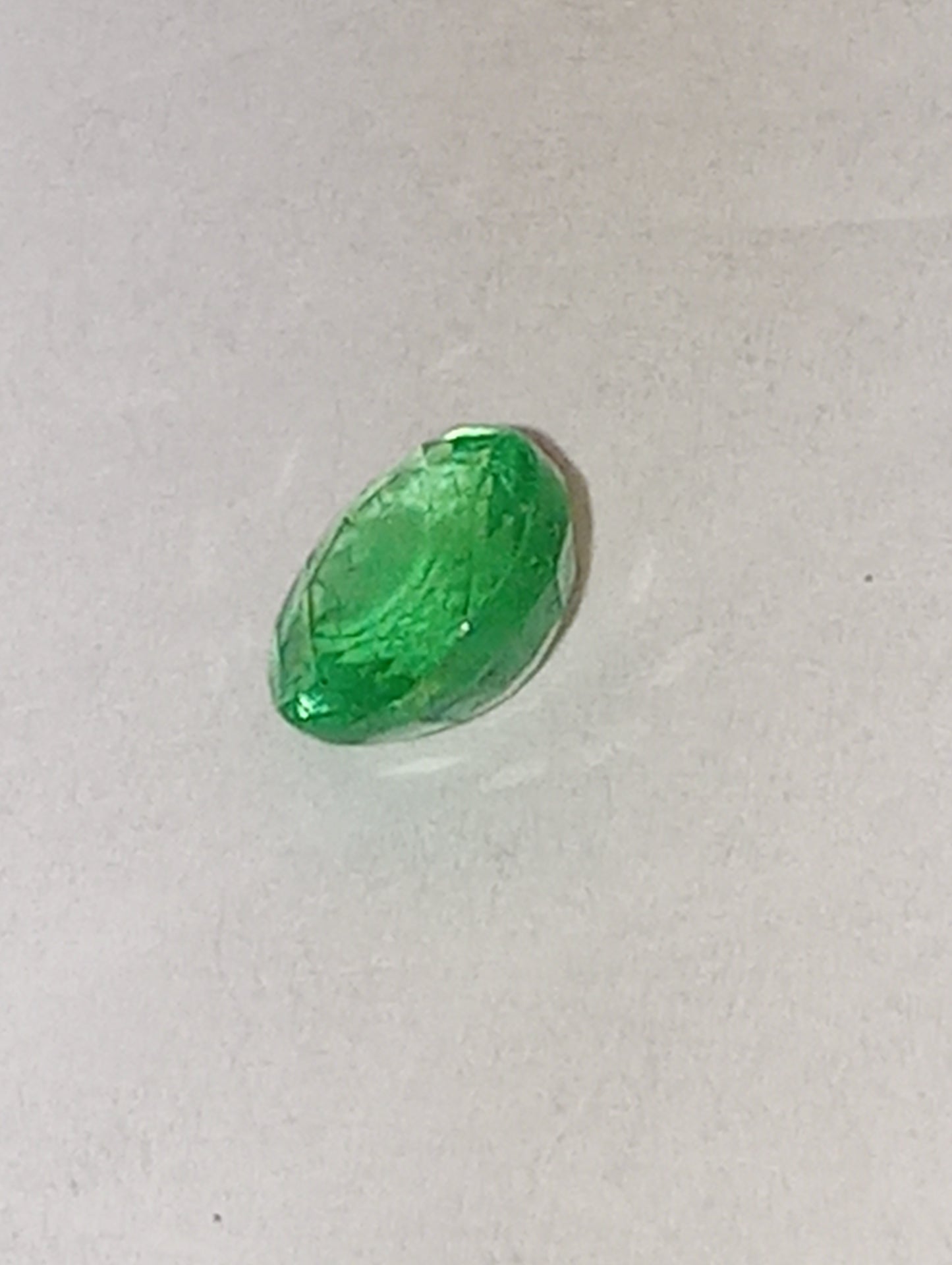 emerald gemstone Nigerian, 5.5mm round cut, .60ct