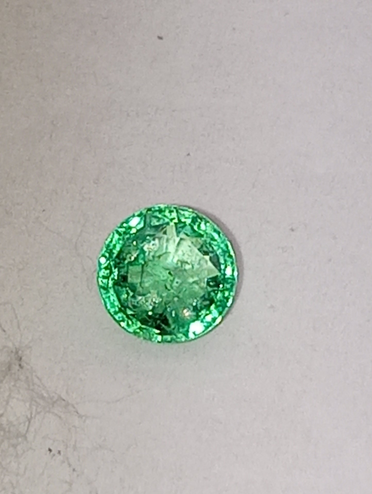 emerald gemstone Nigerian, 5mm round cut, .54ct