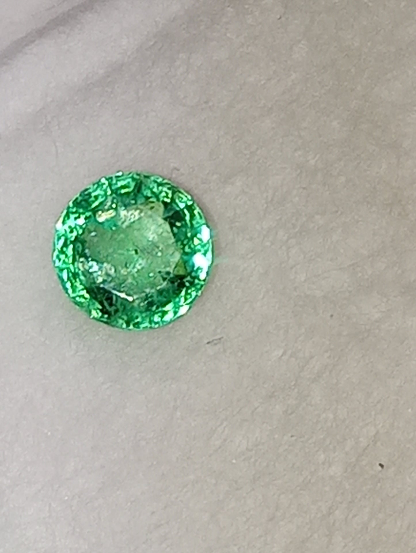 emerald gemstone Nigerian, 5mm round cut, .54ct