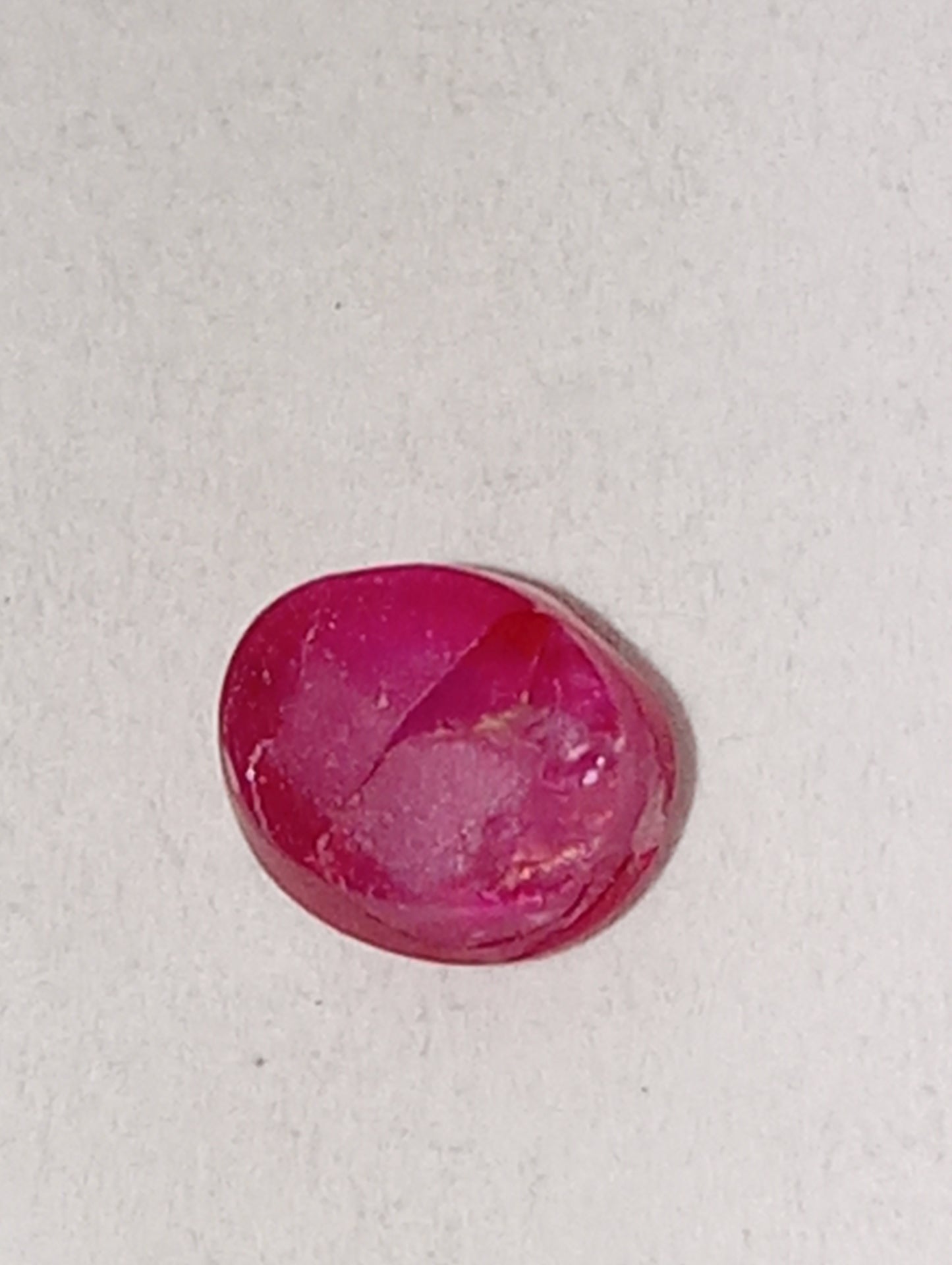 ruby gemstone Burma star, 4.75mmx3.5mm cabocon oval, .84ct