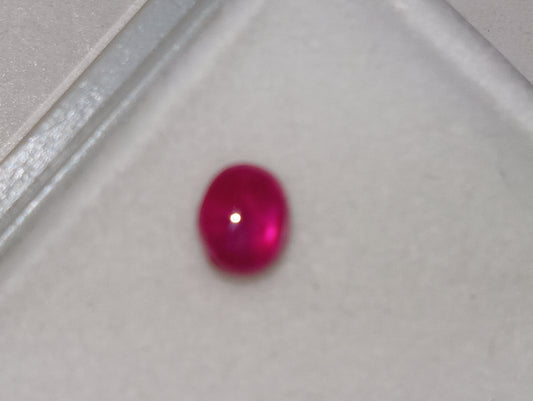 ruby gemstone Burma star, 4.75mmx3.5mm cabocon oval, .84ct