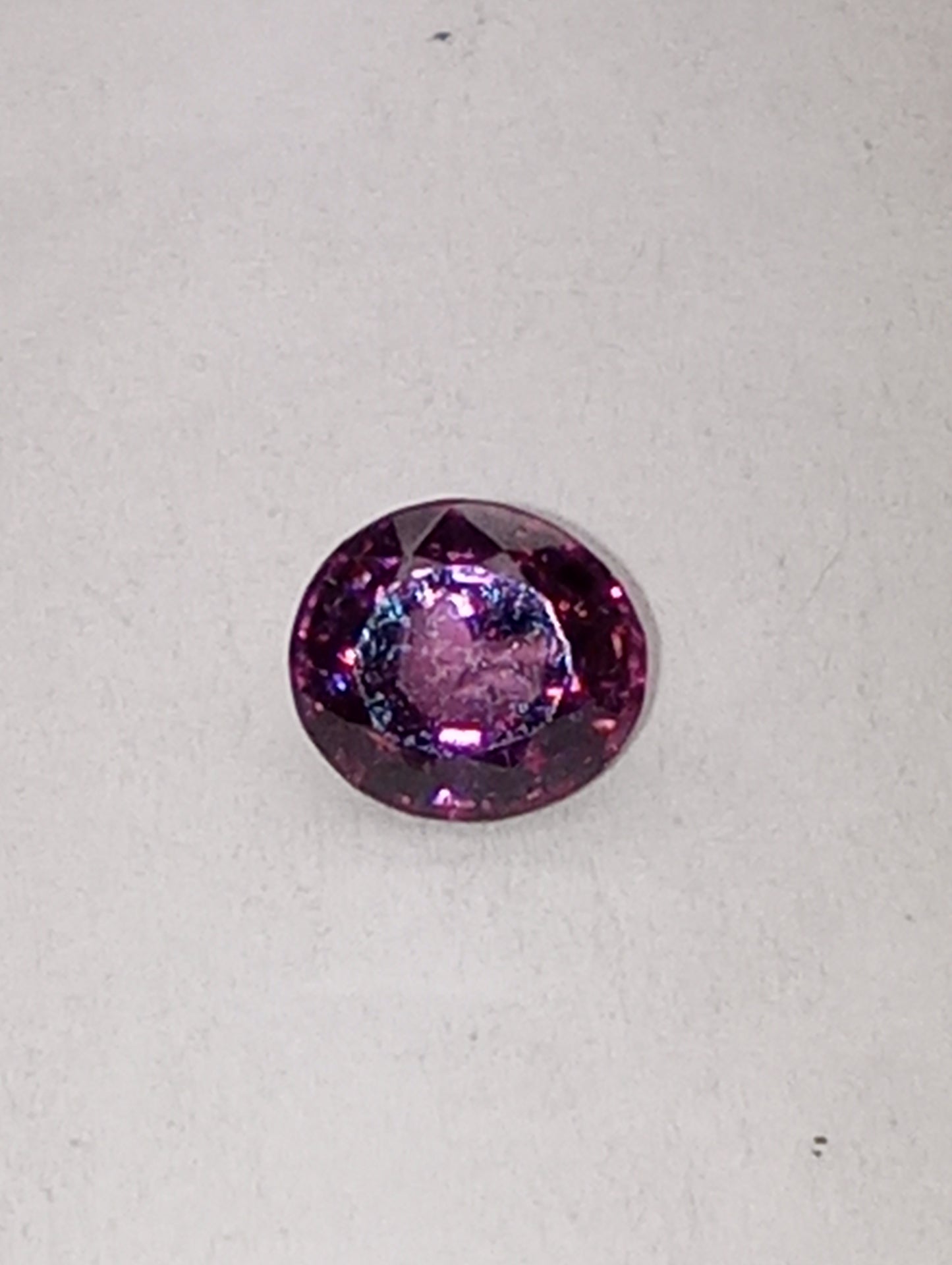 spinel gemstone Burma pinky purple, 6mmx5.5mm oval cut, .84ct