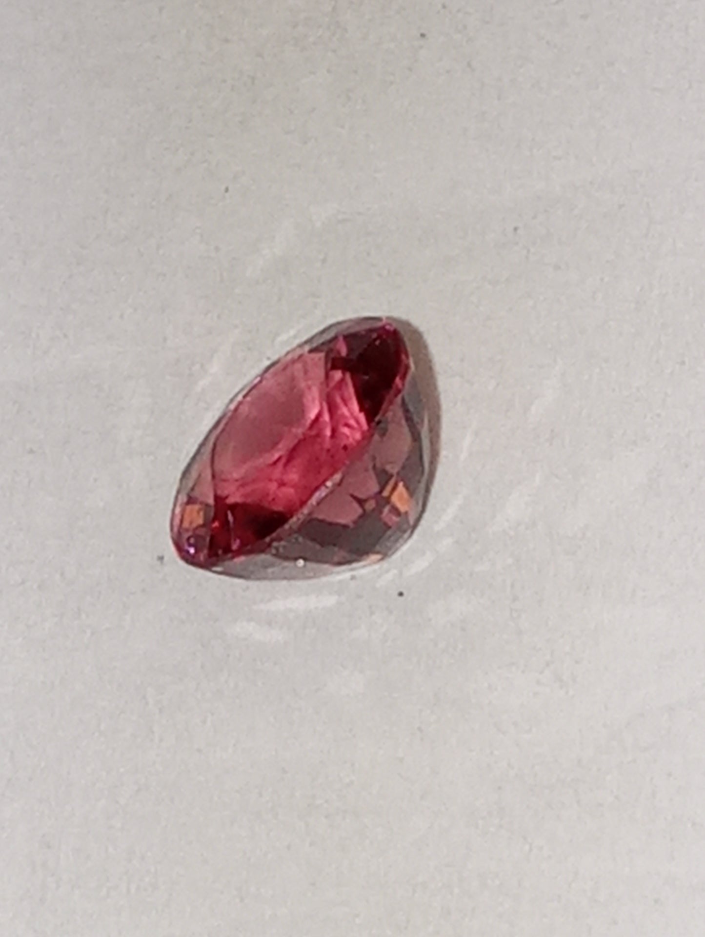 spinel gemstone Burmese, orangey red, 6mmx5.5mm oval cut, .79ct