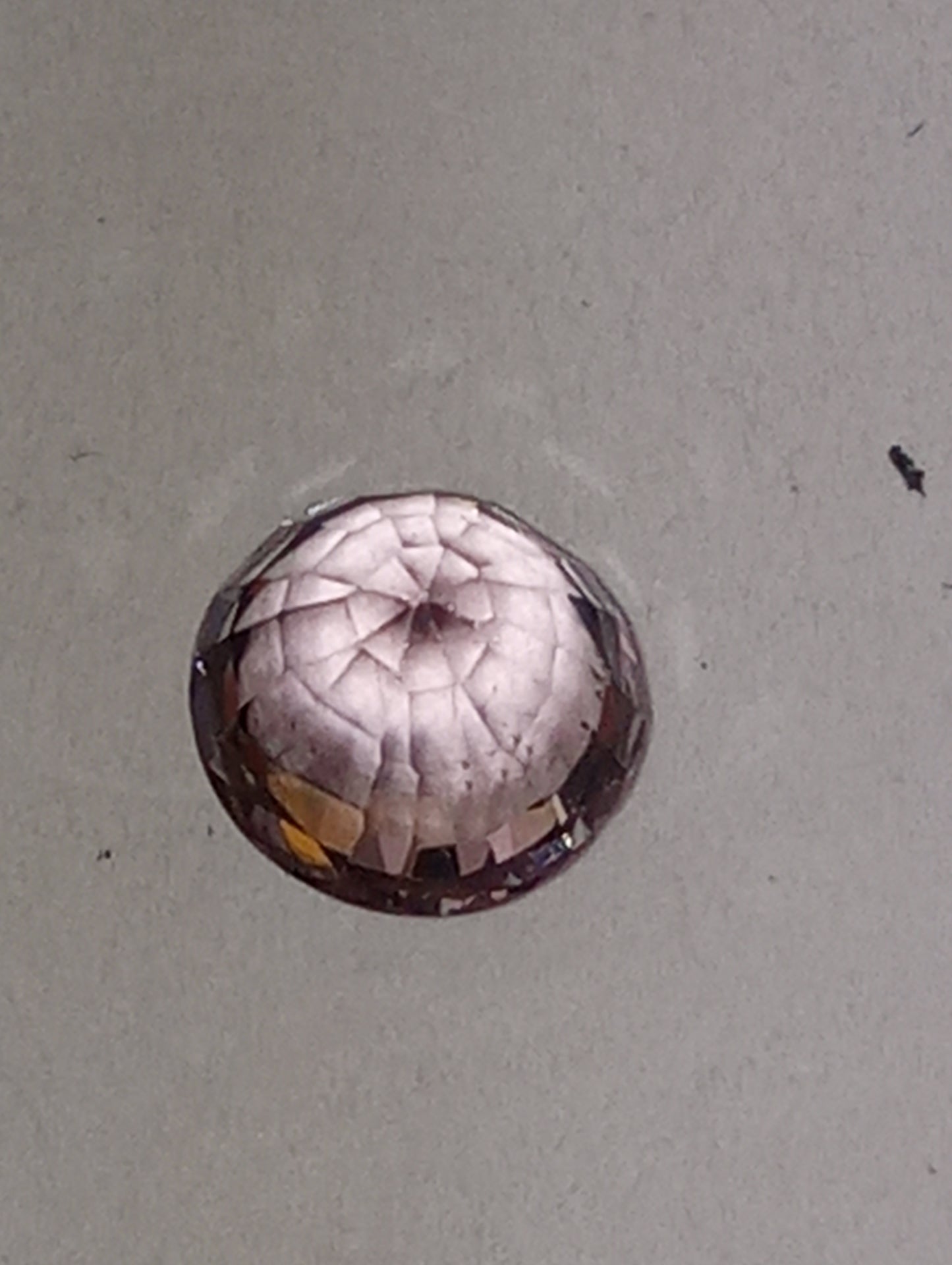 spinel gemstone Burmese, purplish pink,  6mmx5.75mm oval cut, .92ct